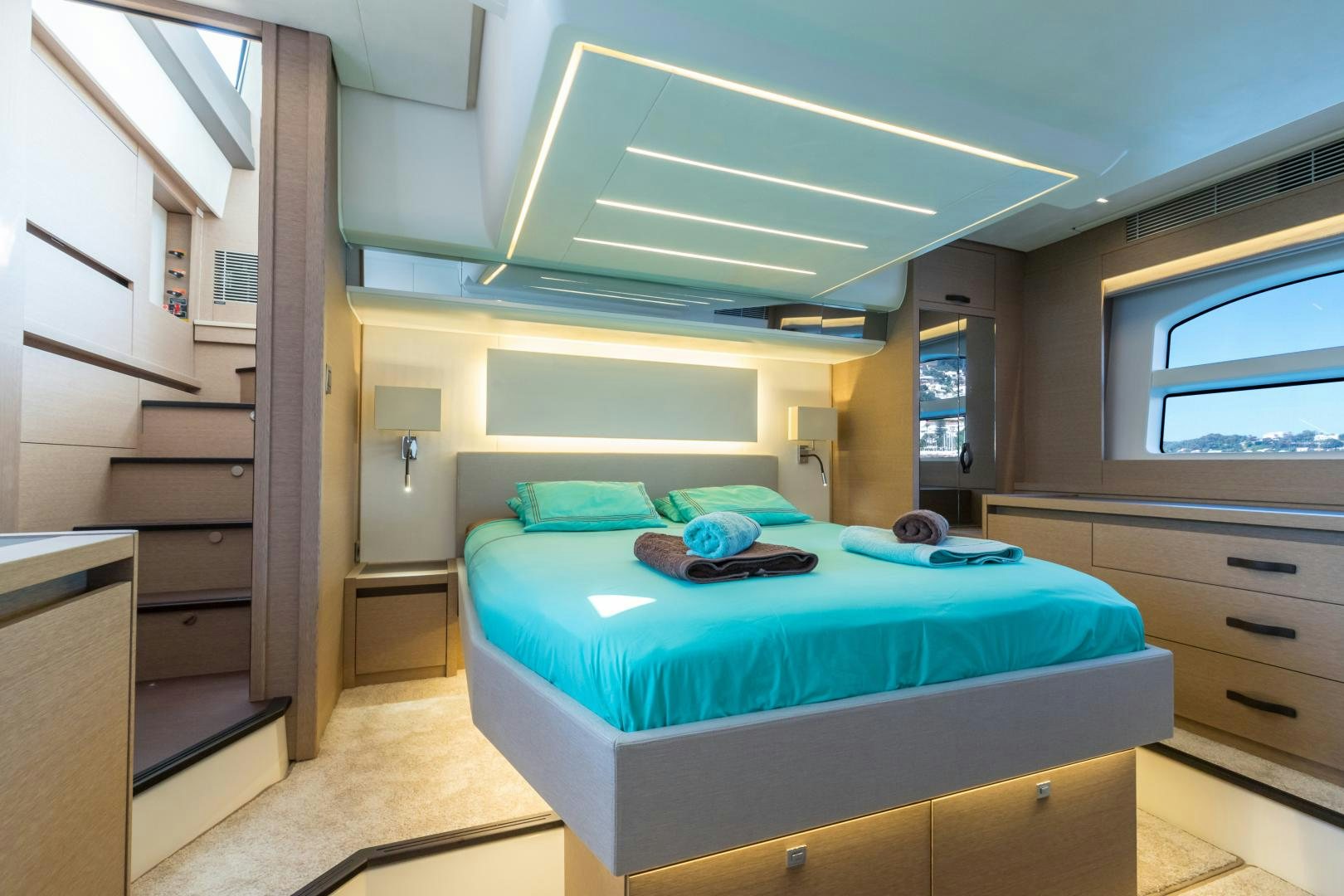 a bedroom with a bed aboard LA HUNE 4.0 Yacht for Sale