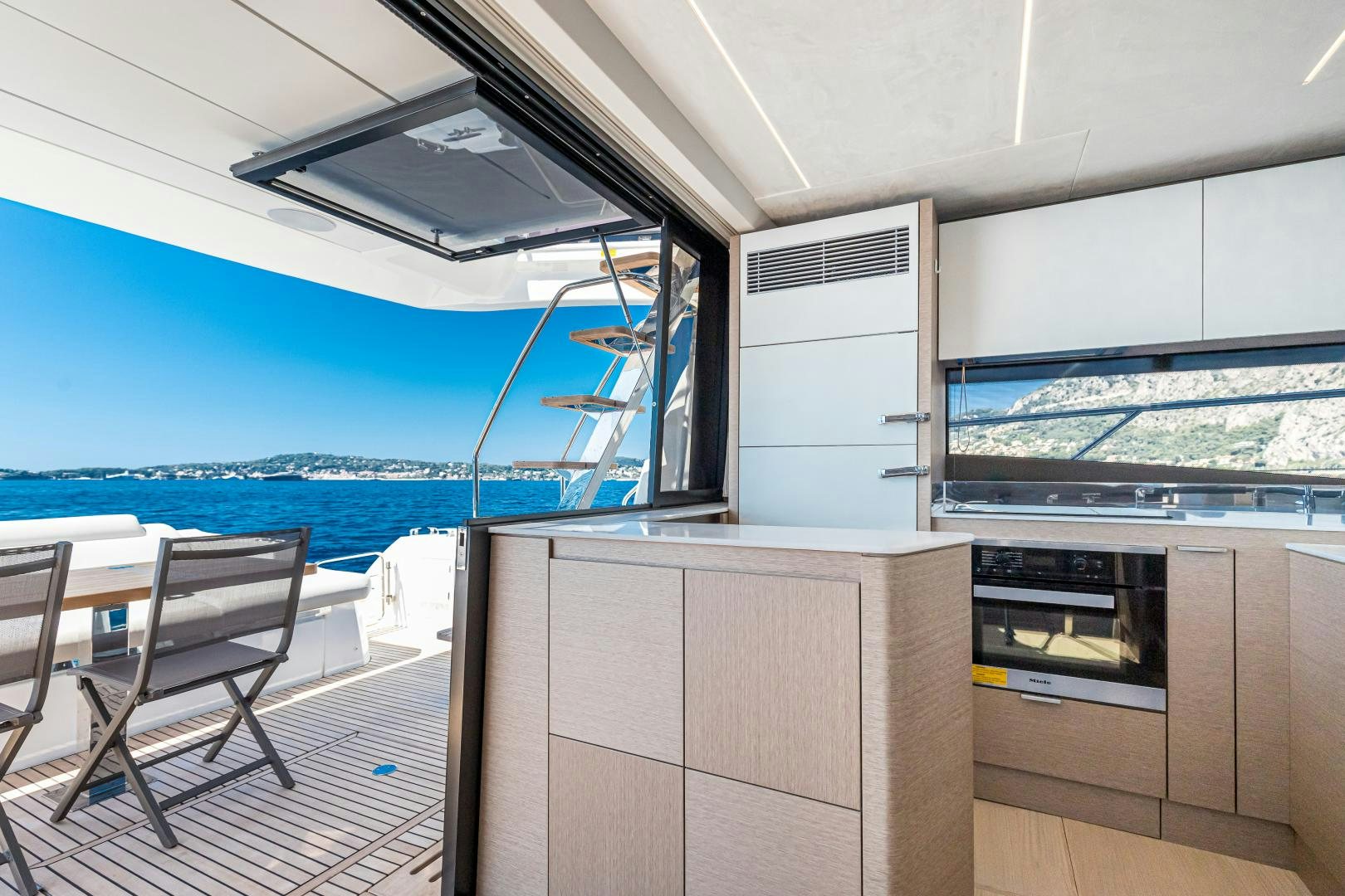 a room with a view of the ocean and the ocean aboard LA HUNE 4.0 Yacht for Sale