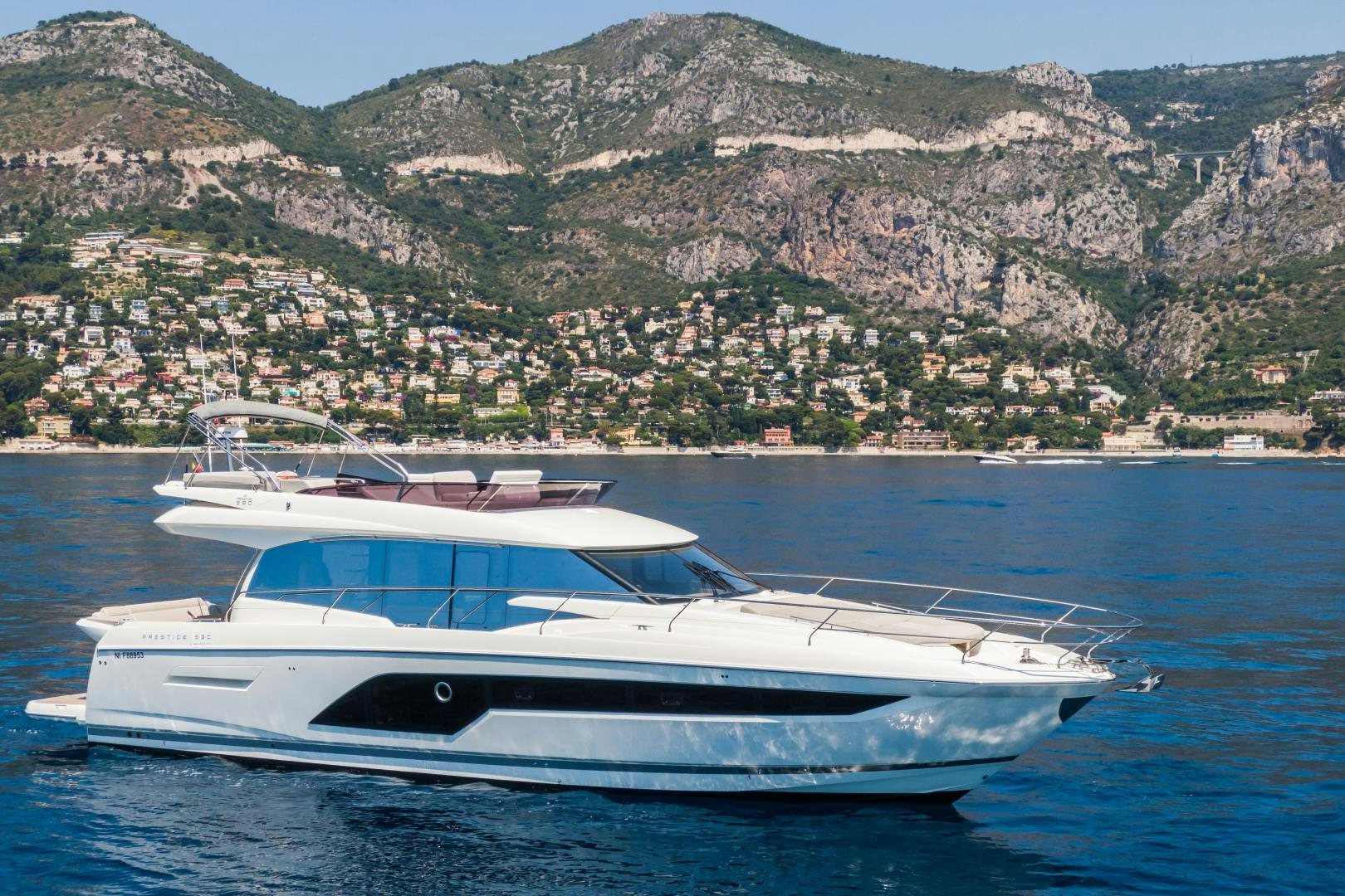 a white yacht in the water aboard LA HUNE 4.0 Yacht for Sale
