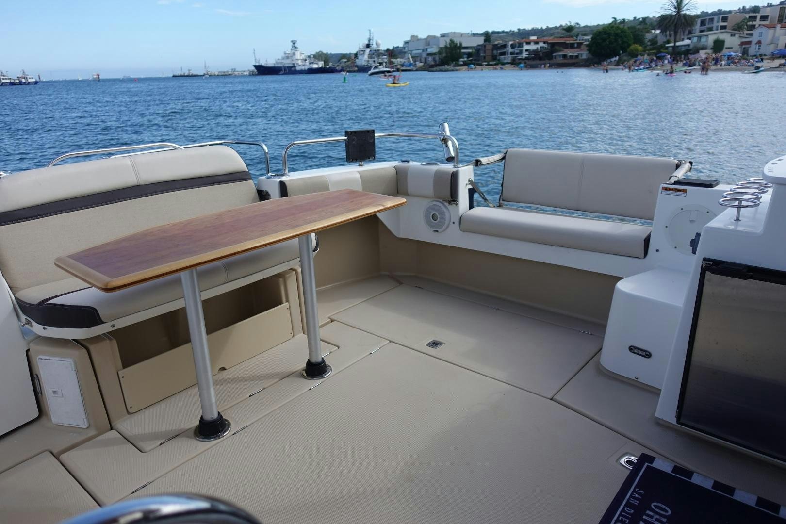 a group of white tables on a boat aboard OHANA Yacht for Sale