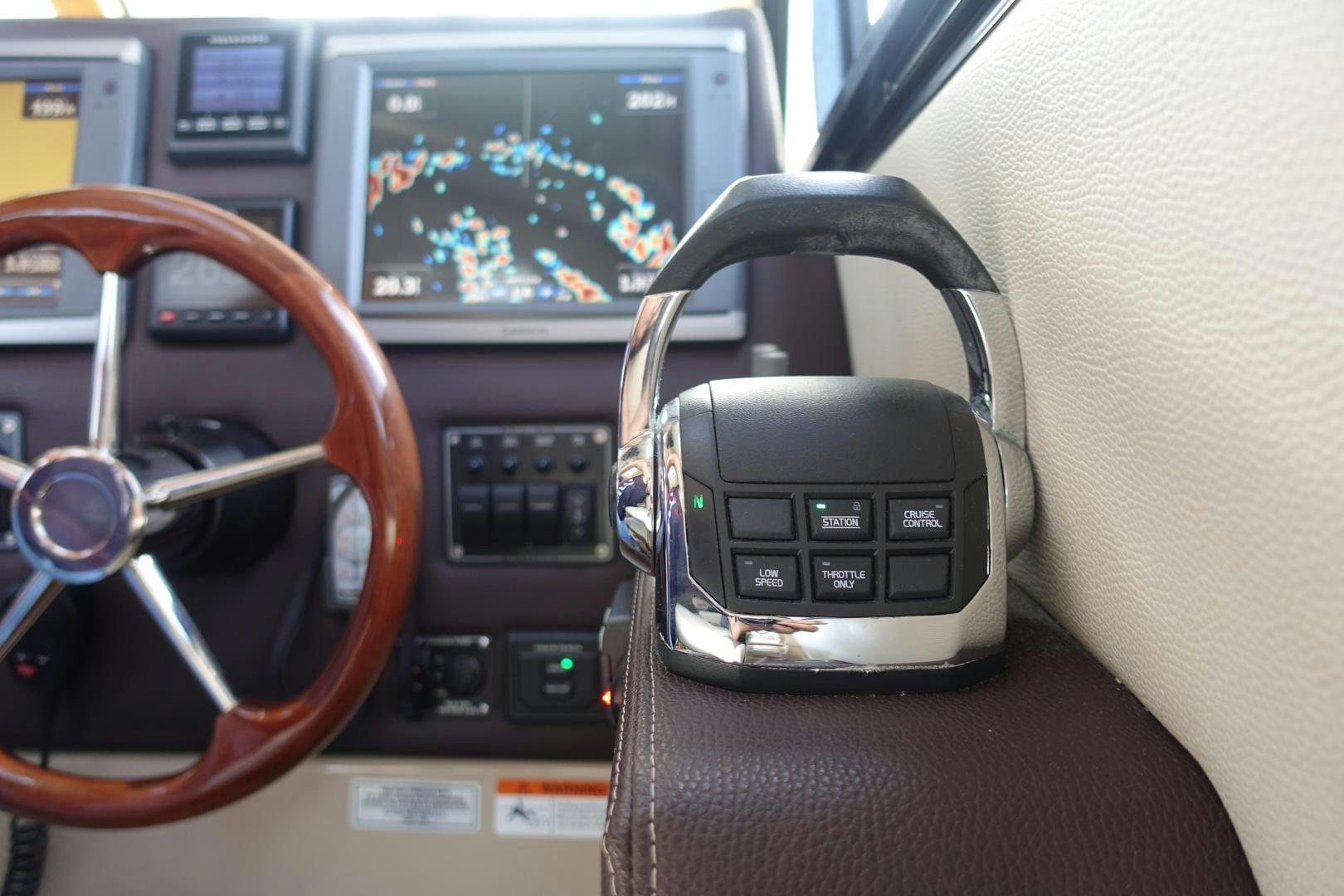 a car with a radio in the back aboard OHANA Yacht for Sale