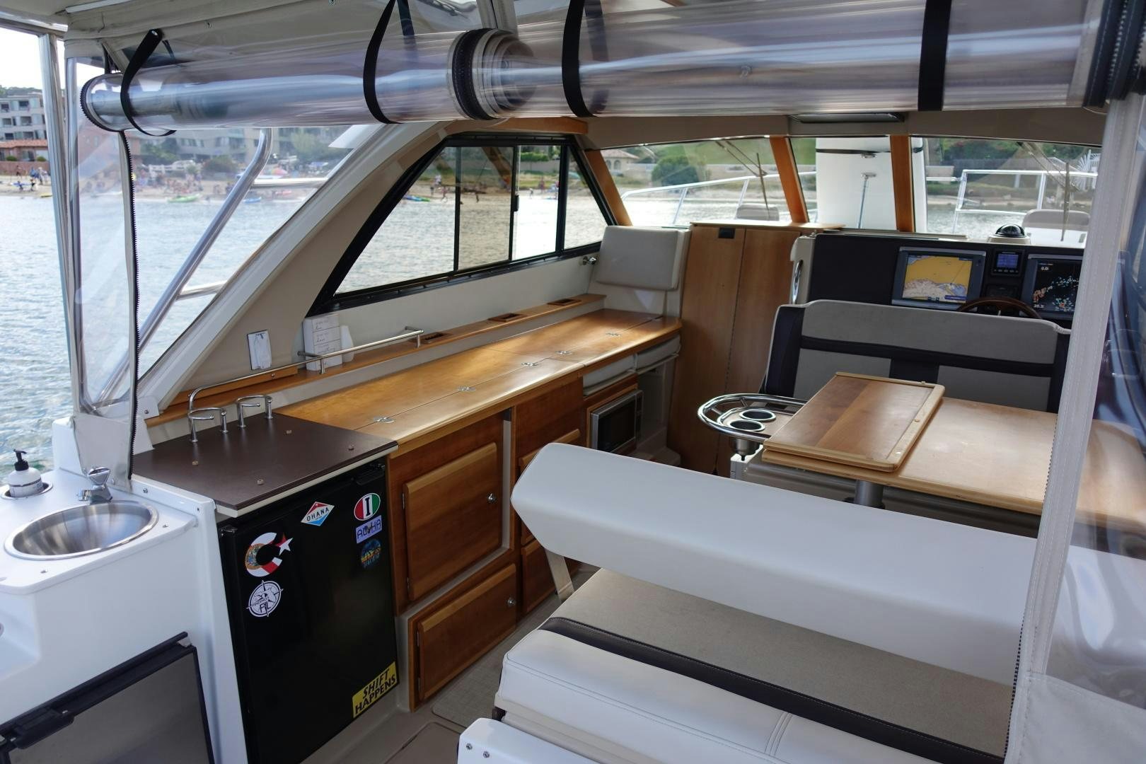 a kitchen with a counter and cabinets aboard OHANA Yacht for Sale