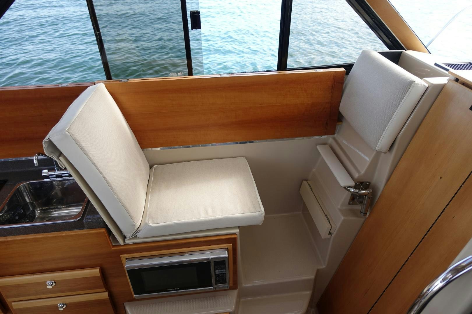 a white box on a wooden surface aboard OHANA Yacht for Sale
