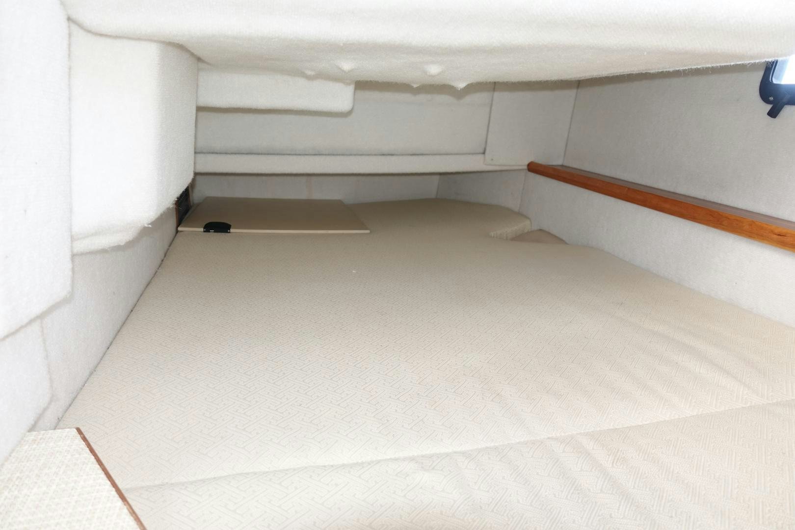 a white room with a white floor aboard OHANA Yacht for Sale
