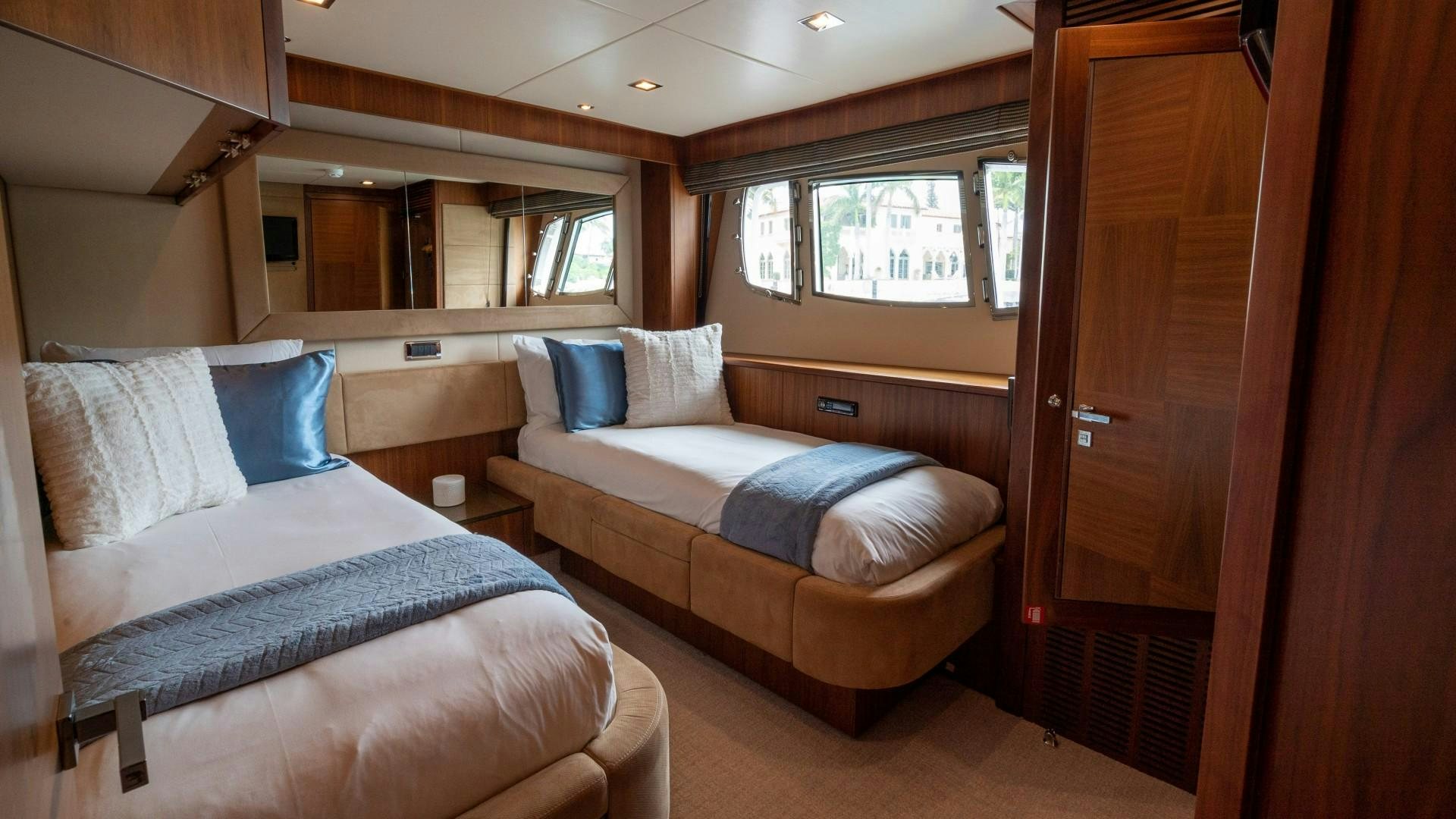 a couple of beds in a room aboard SPLASHED OUT Yacht for Sale