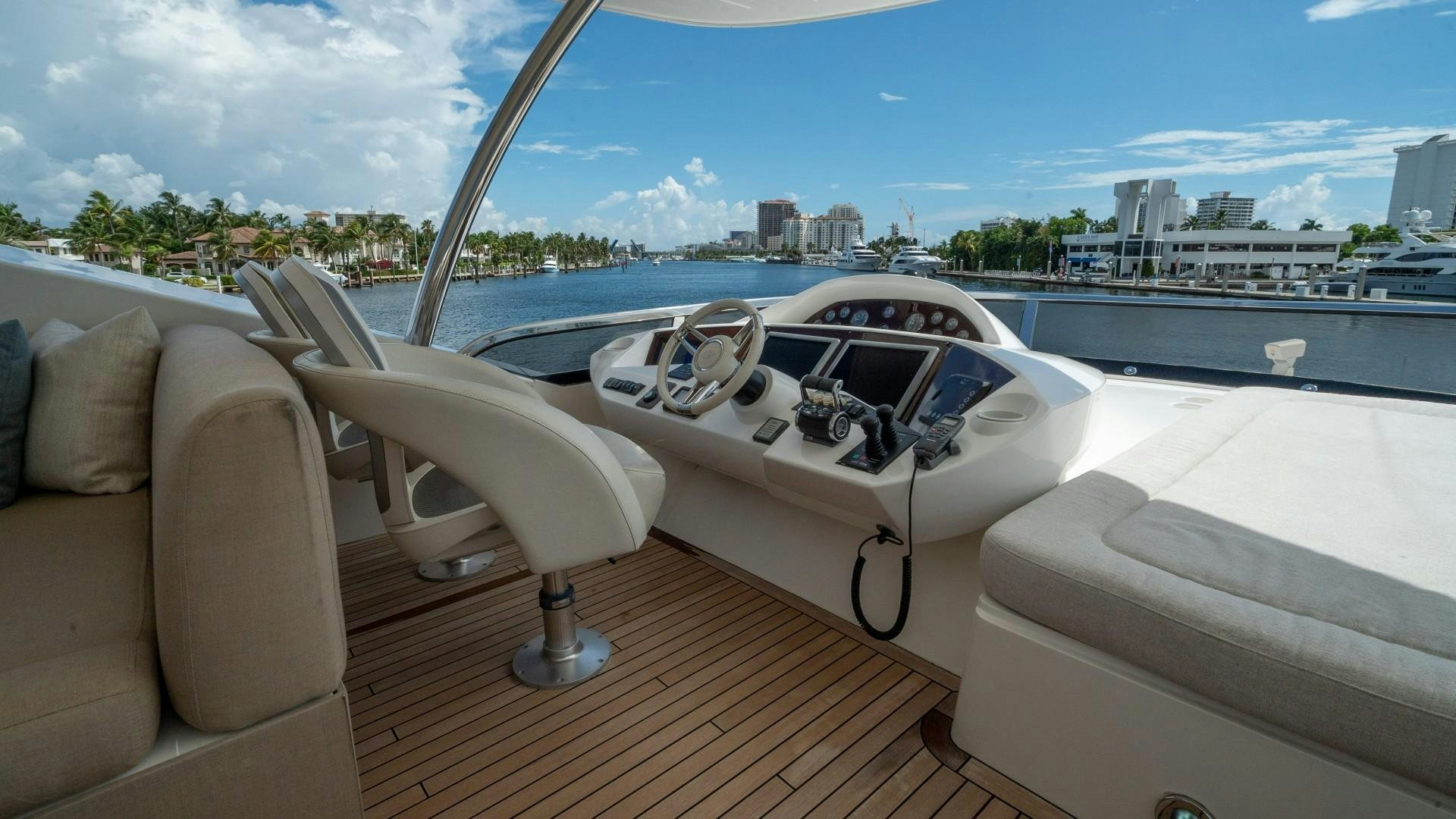 a white yacht on a deck aboard SPLASHED OUT Yacht for Sale