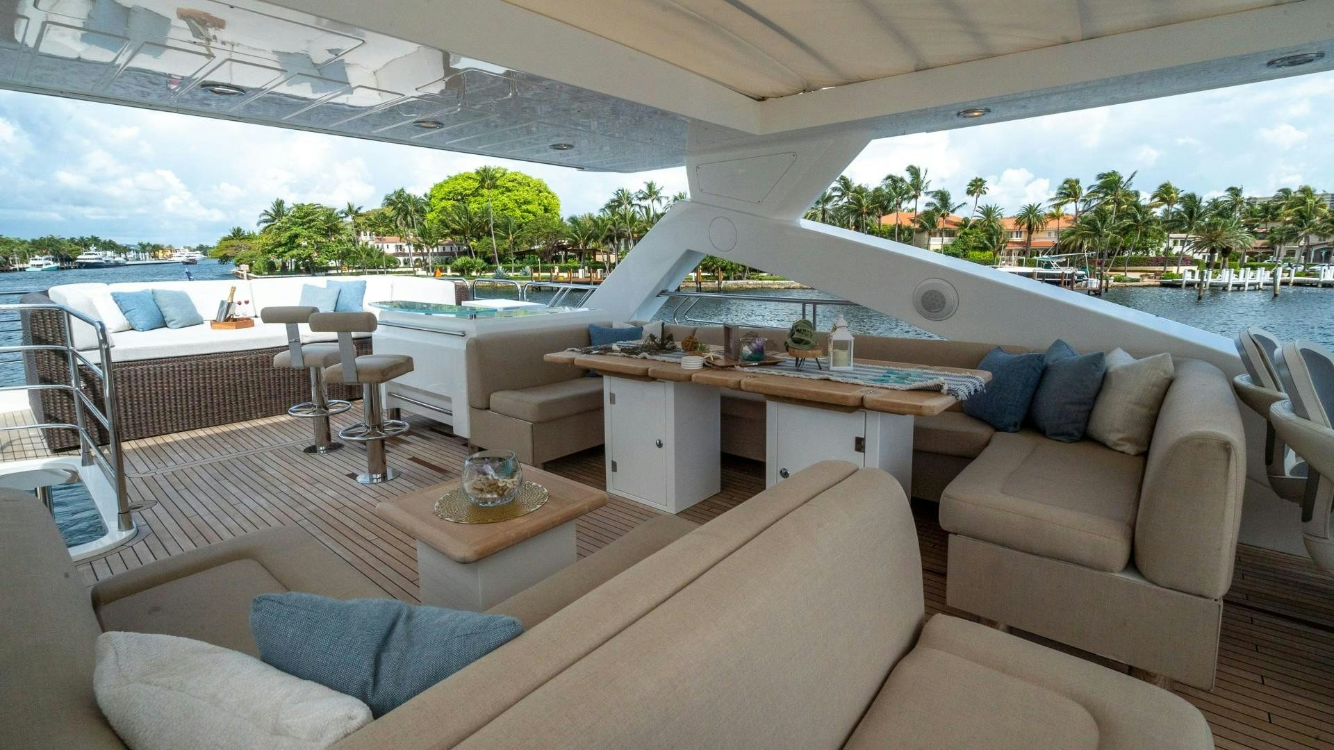 a living room with a large patio aboard SPLASHED OUT Yacht for Sale