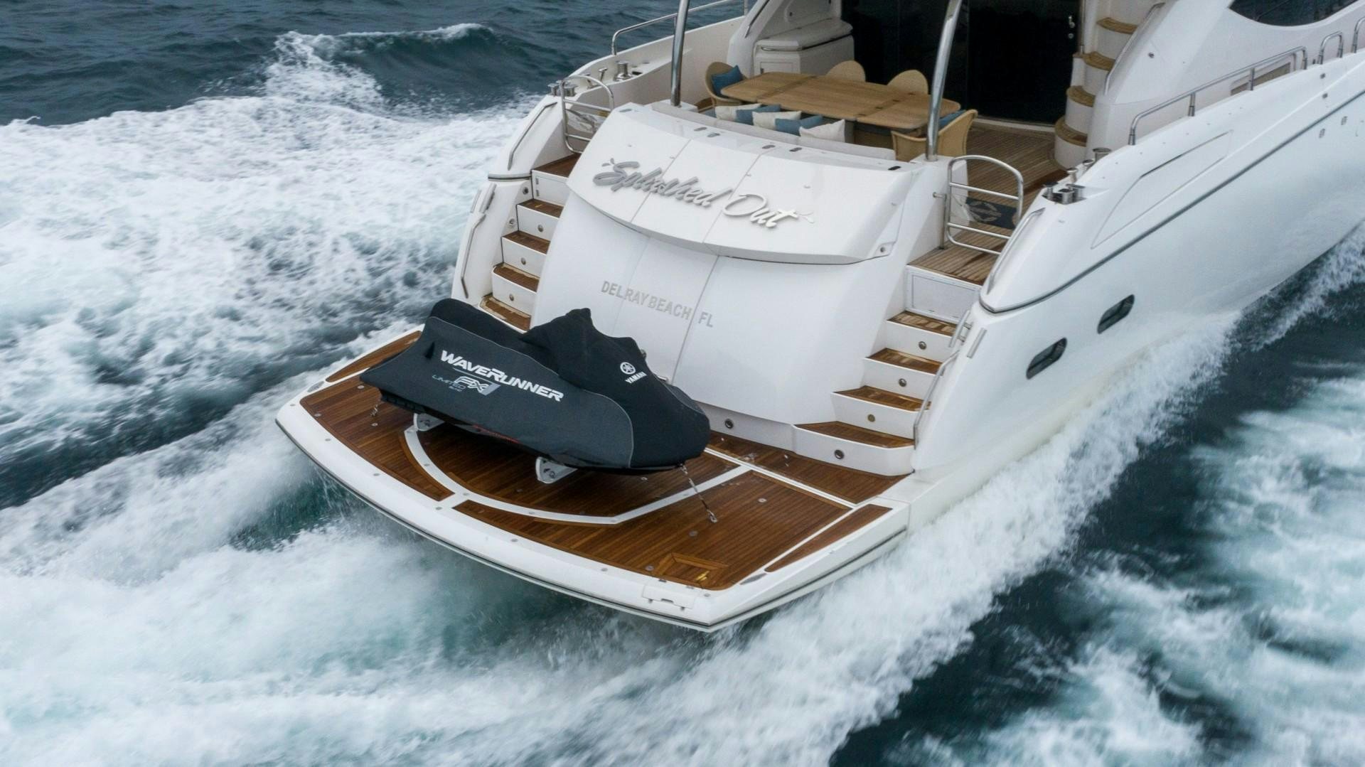 a laptop on a boat aboard SPLASHED OUT Yacht for Sale