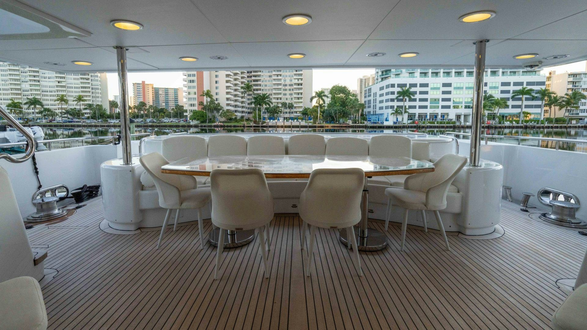 a large room with tables and chairs aboard THE PEARL Yacht for Sale