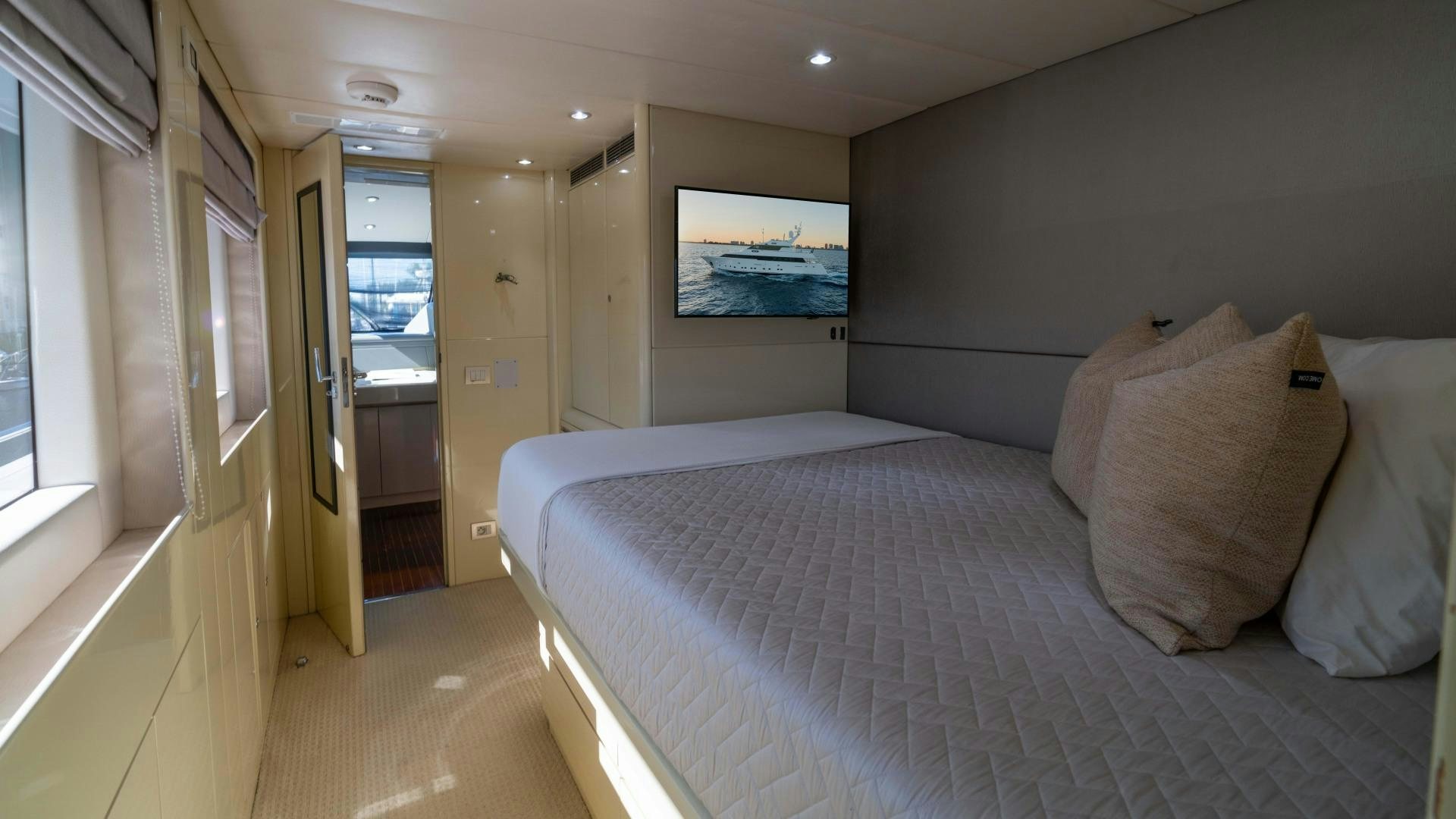 a bed in a room aboard THE PEARL Yacht for Sale
