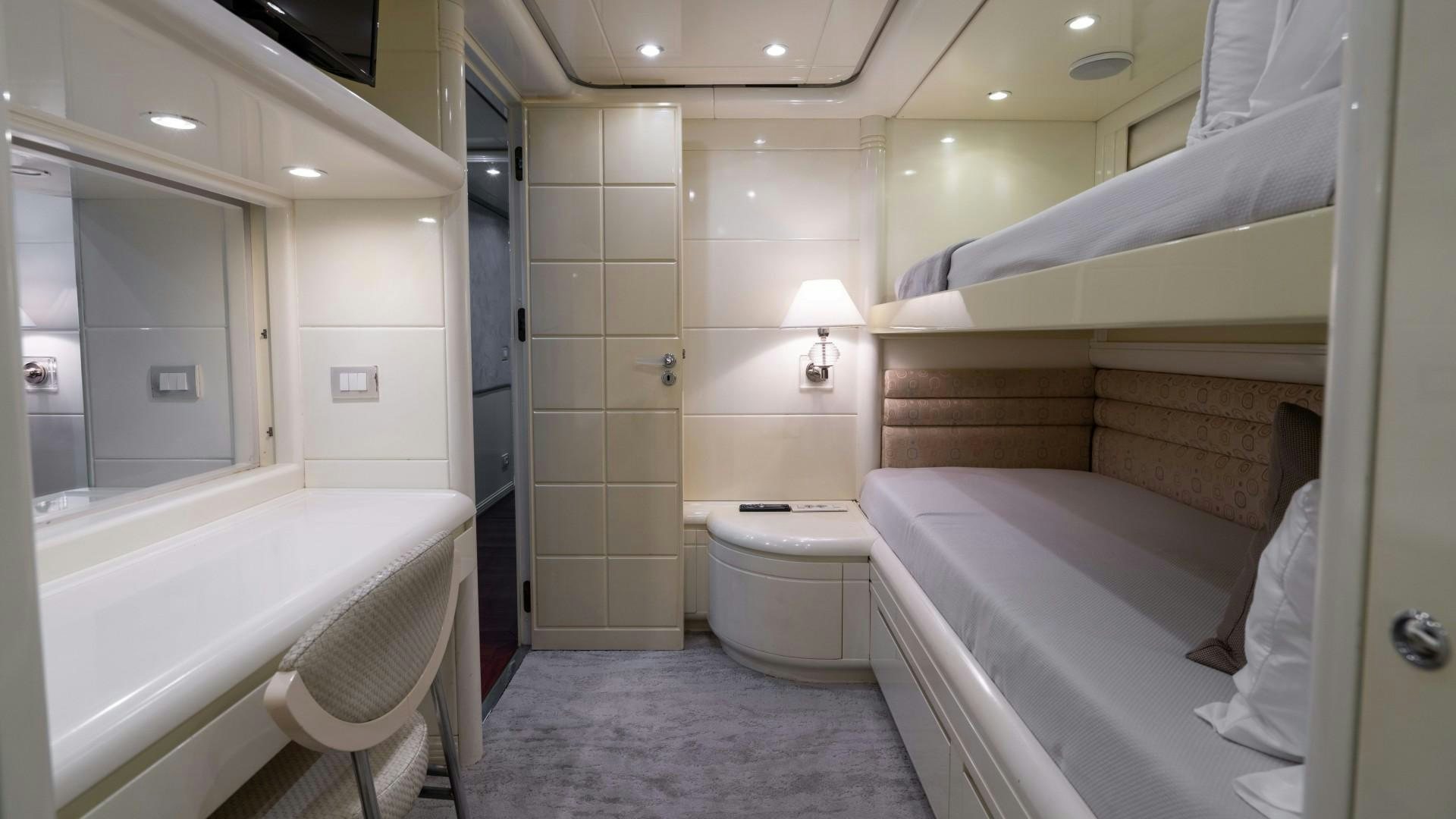 a bathroom with a tub toilet and sink aboard THE PEARL Yacht for Sale