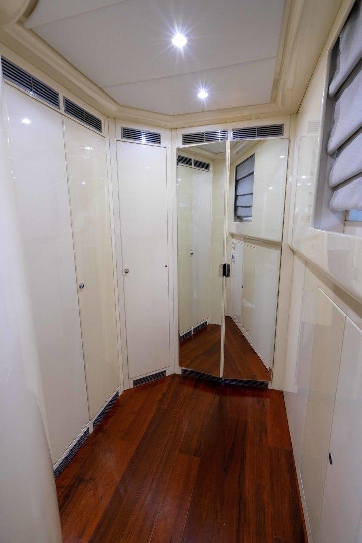 a hallway with white doors aboard THE PEARL Yacht for Sale