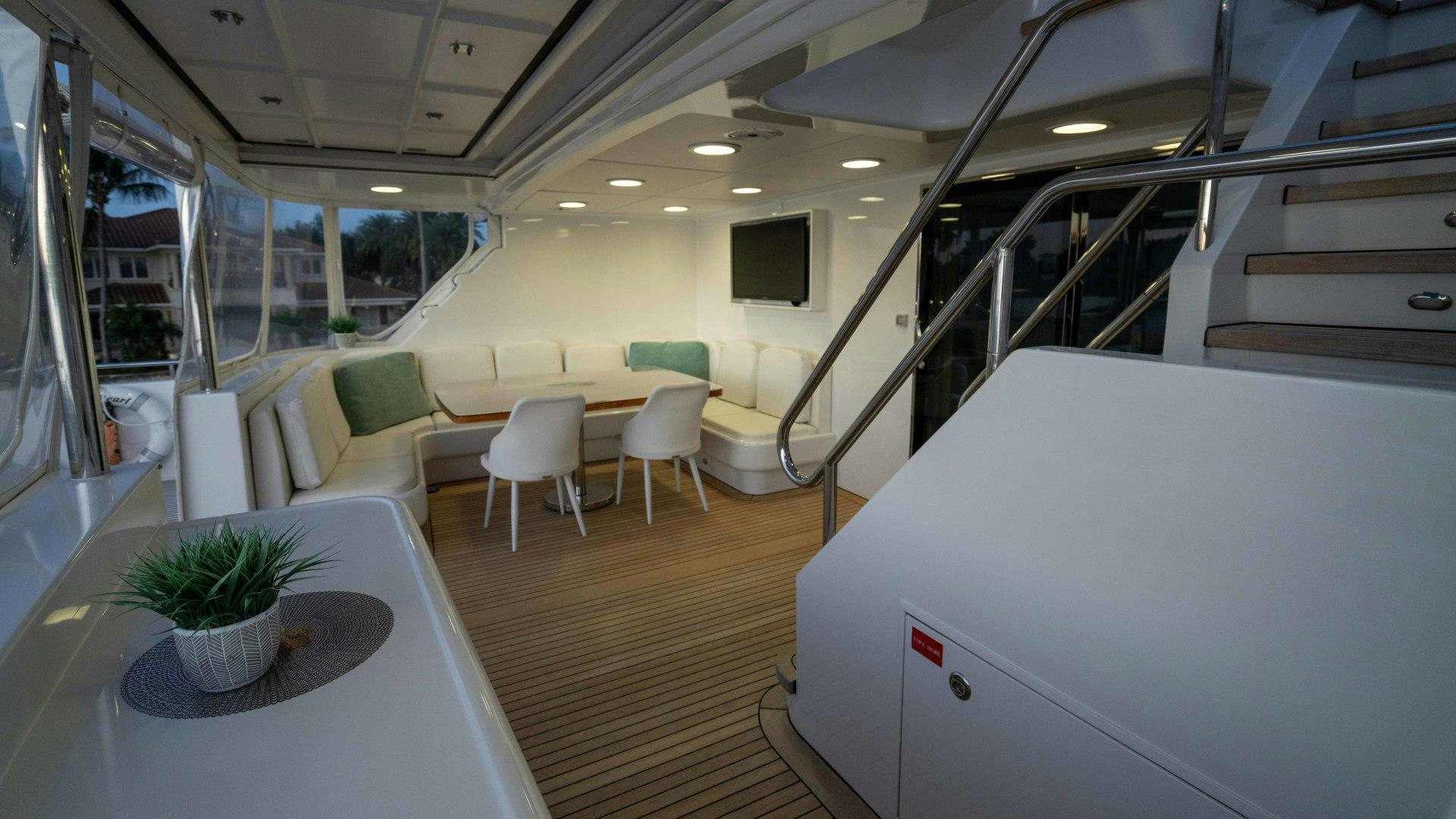 a large room with tables and chairs aboard THE PEARL Yacht for Sale