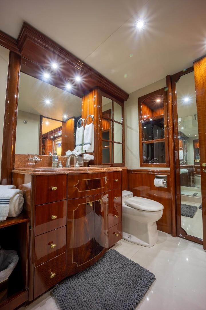a bathroom with a large mirror aboard PASSION Yacht for Sale