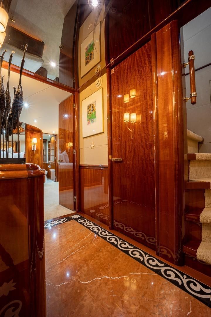 a wood door in a building aboard PASSION Yacht for Sale