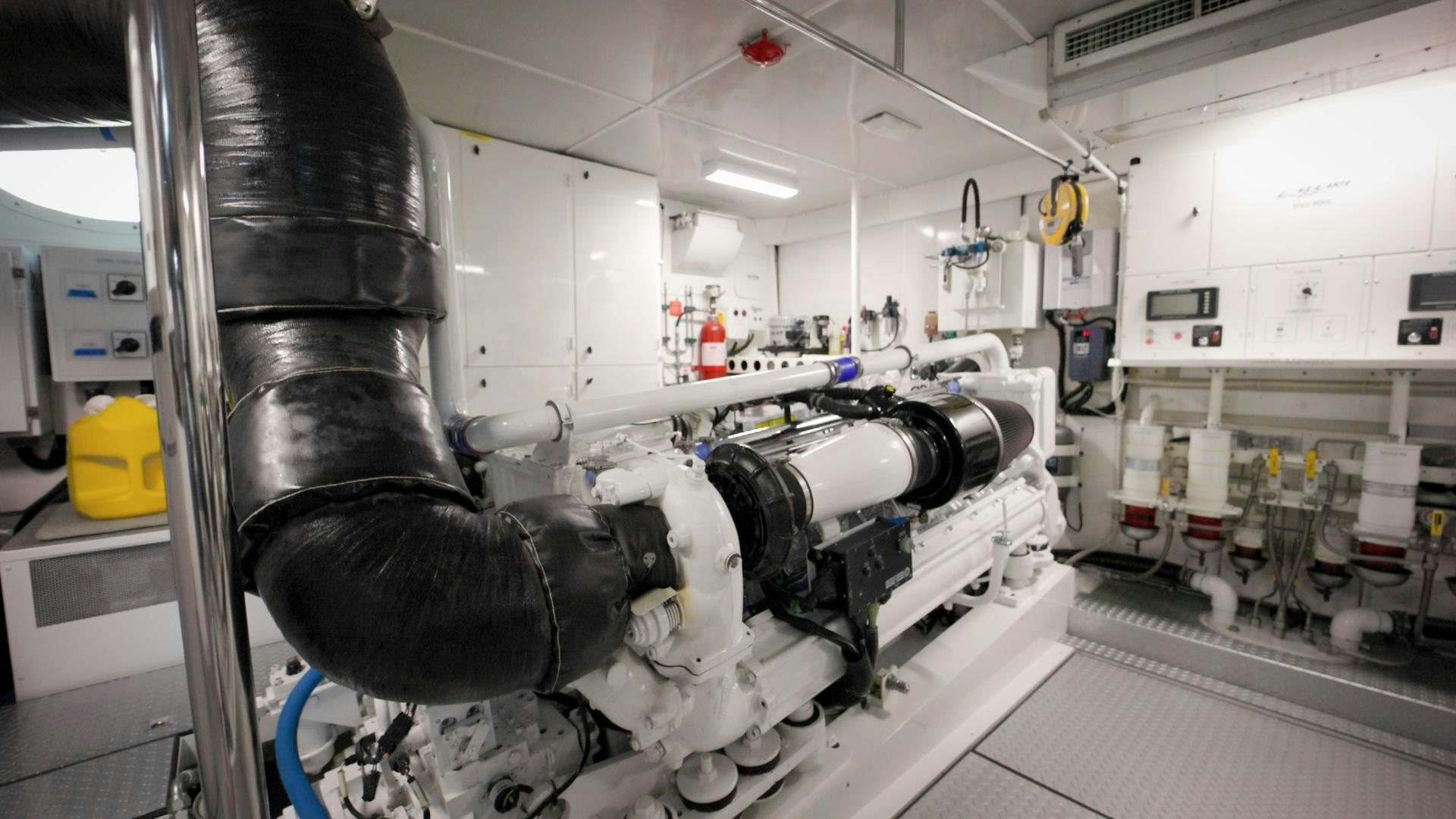 a machine in a room aboard PASSION Yacht for Sale