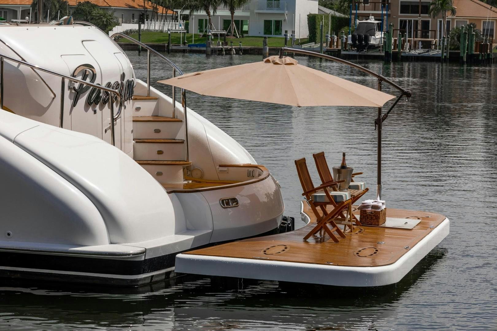 a couple of boats sit in a harbor aboard PASSION Yacht for Sale