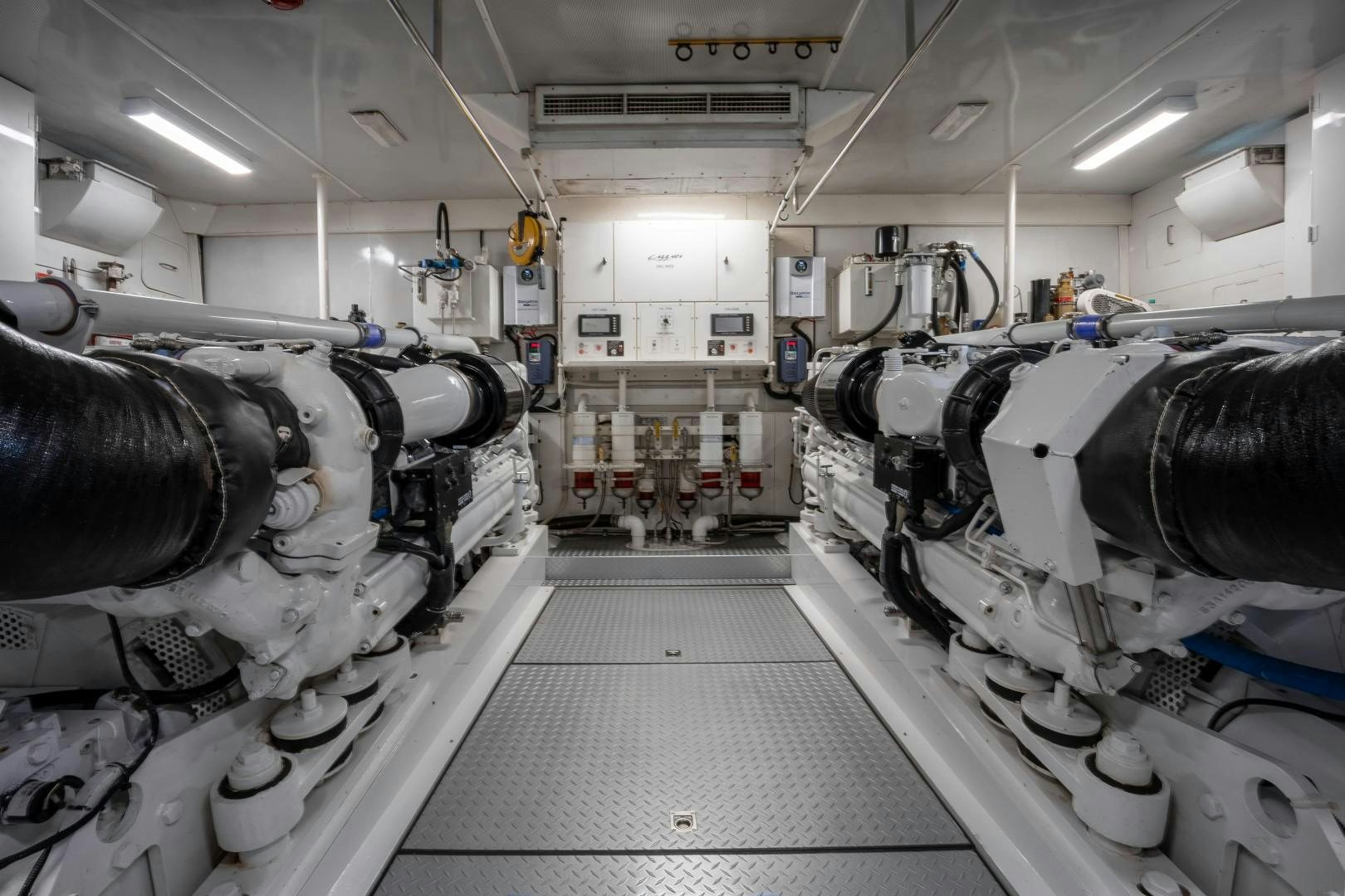 a room with large pipes aboard PASSION Yacht for Sale