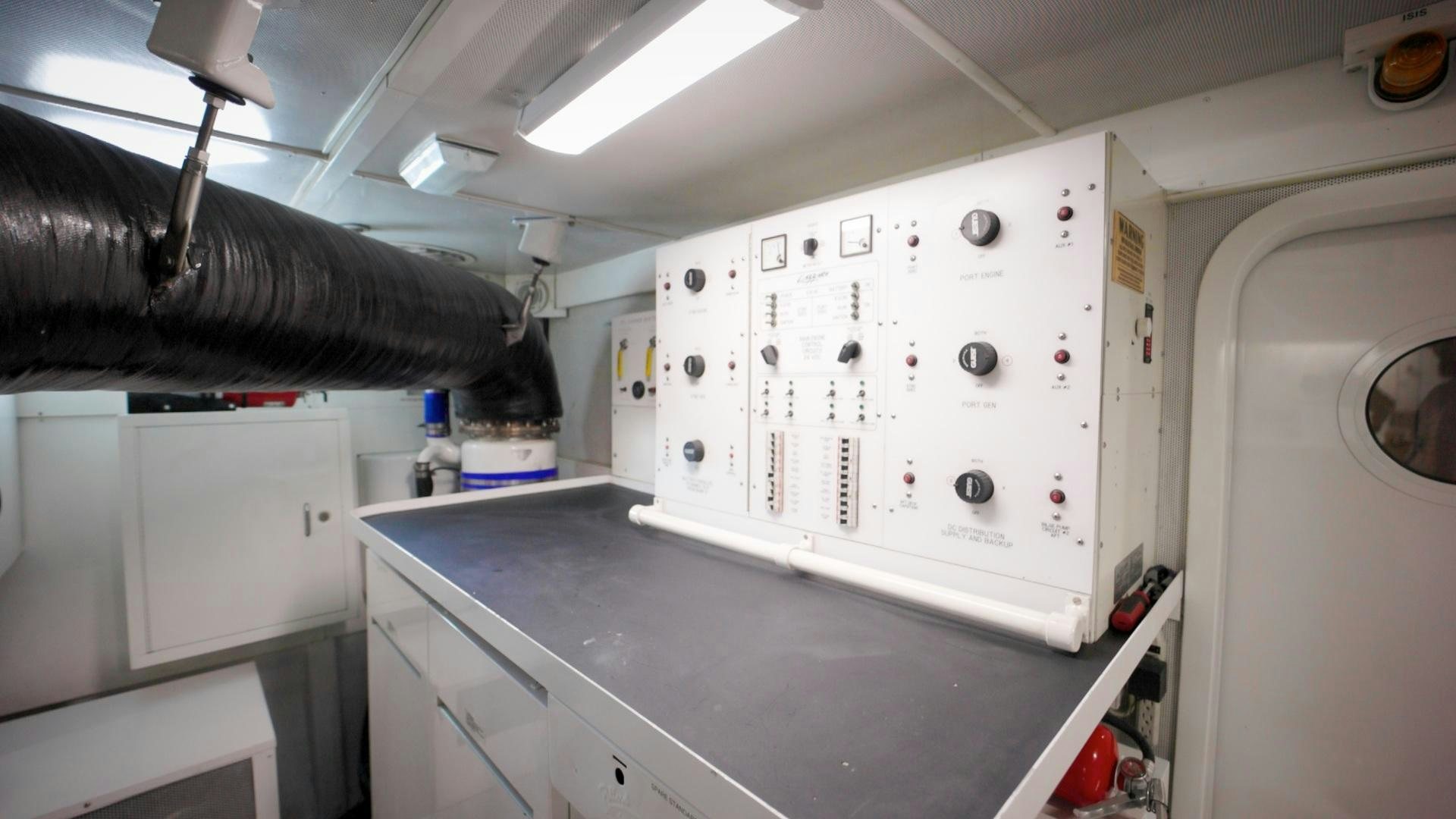 a machine with a large piece of equipment on it aboard PASSION Yacht for Sale