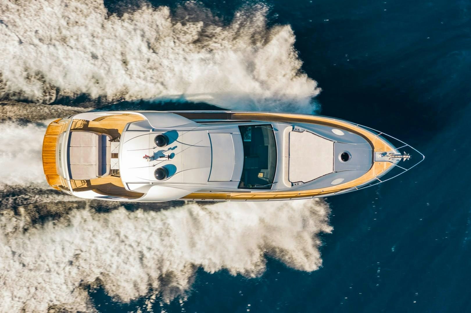 a helicopter flying over a planet aboard Q80 Yacht for Sale