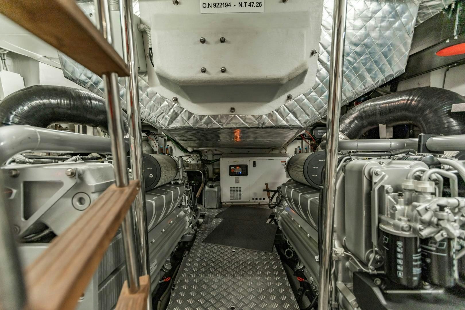 a large machine in a factory aboard Q80 Yacht for Sale