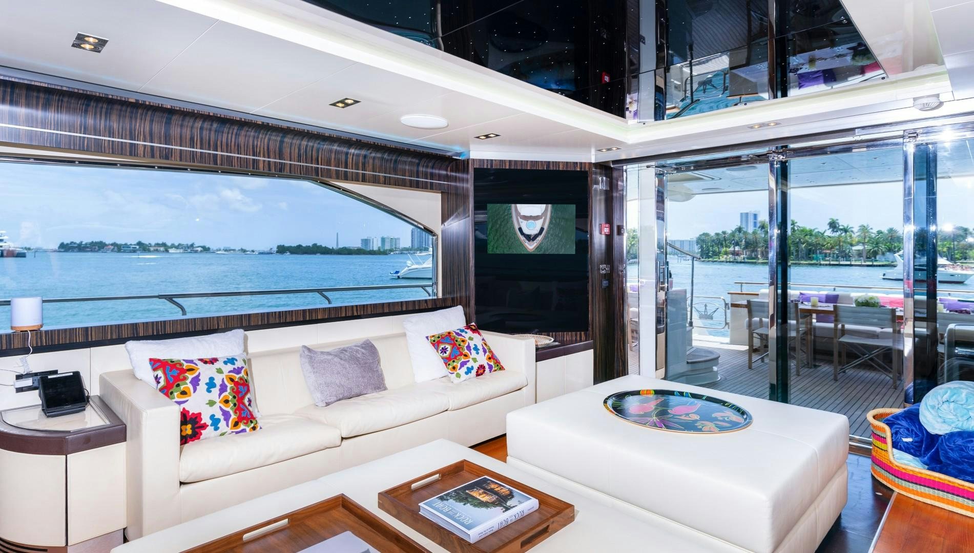 a living room with a large window aboard CASUAL Yacht for Sale