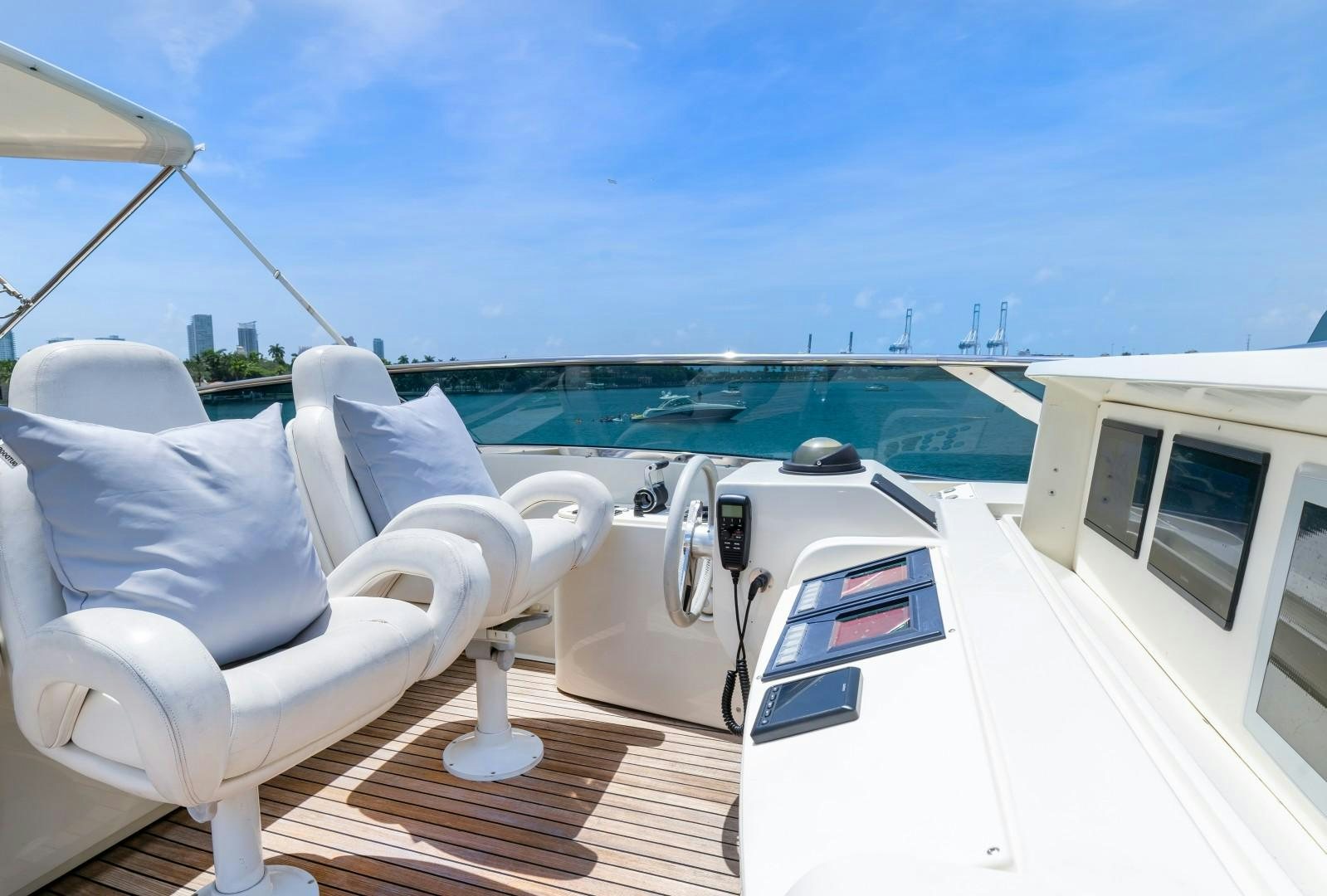 a deck with chairs and a boat aboard CASUAL Yacht for Sale