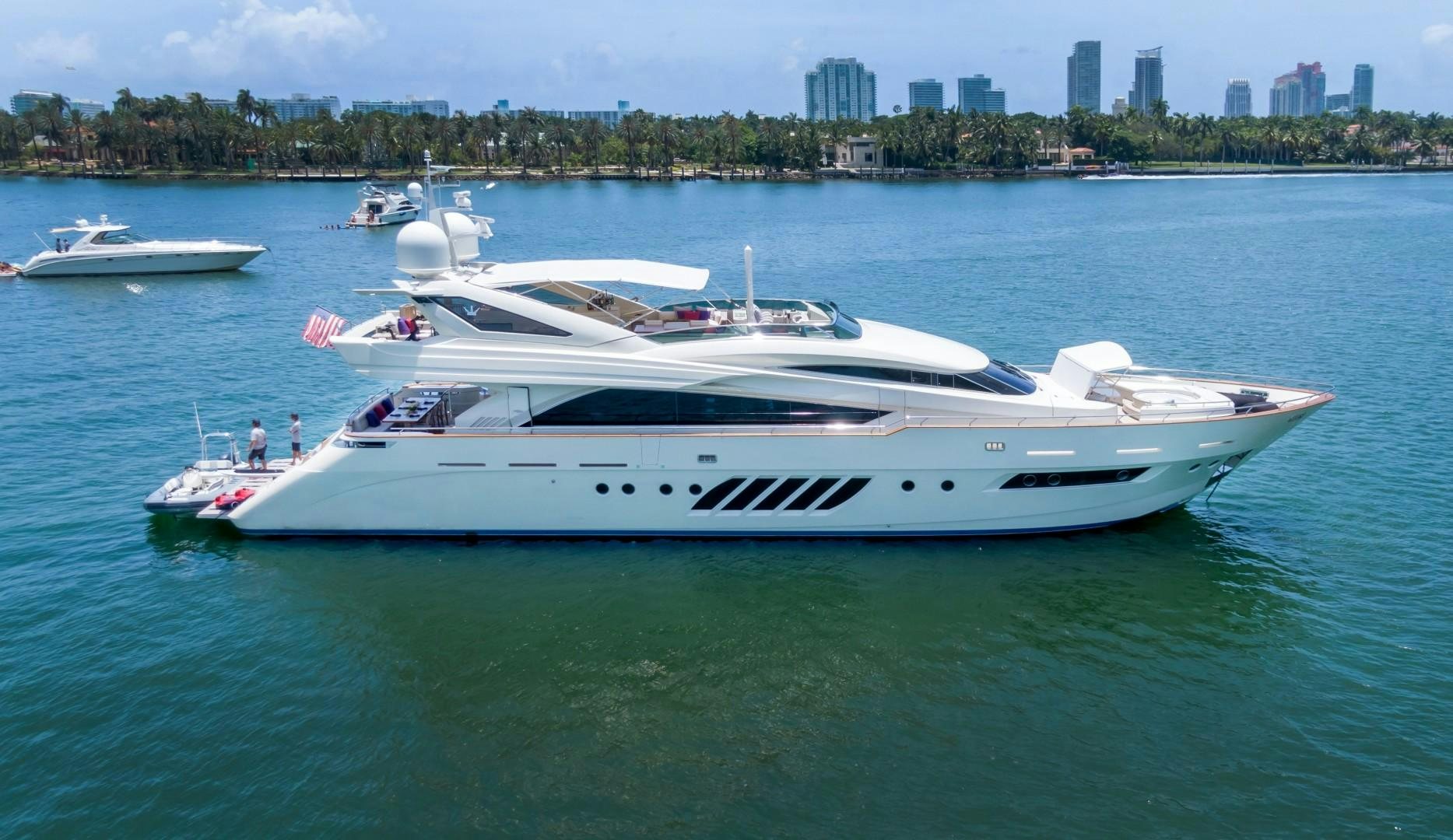a white yacht on the water aboard CASUAL Yacht for Sale