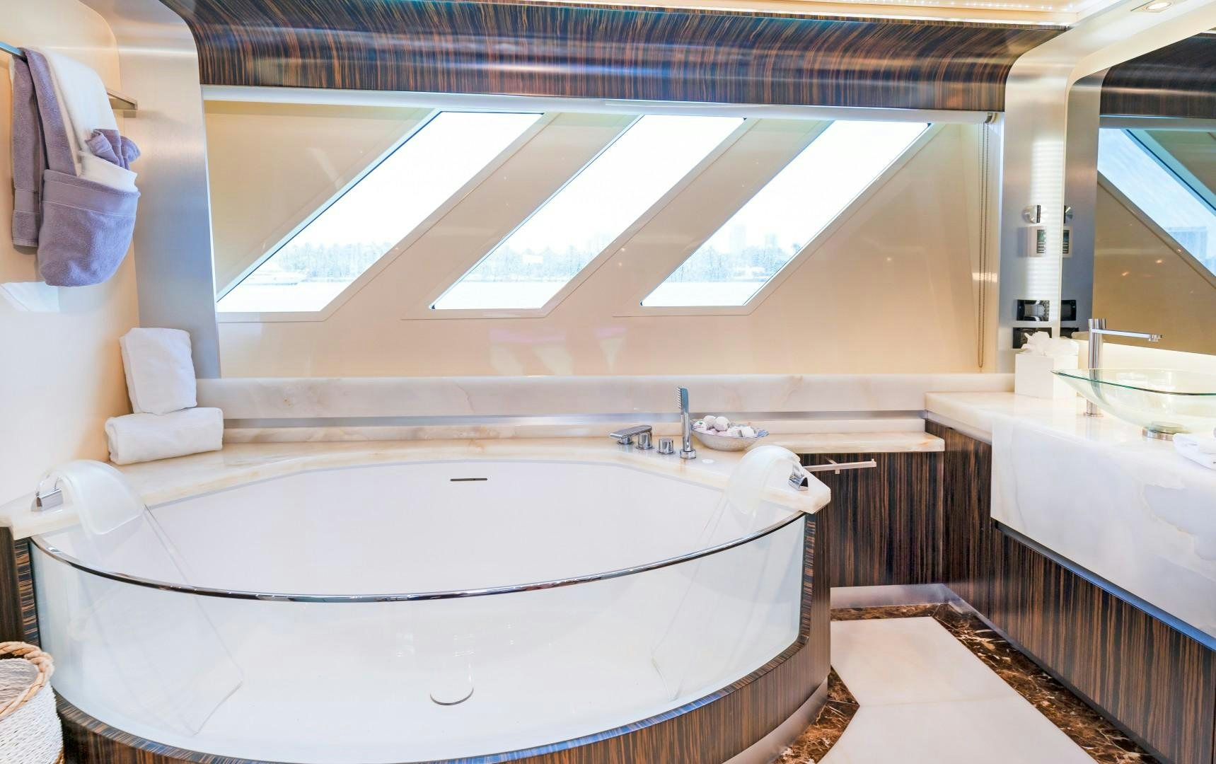 a bathroom with a large bathtub aboard CASUAL Yacht for Sale
