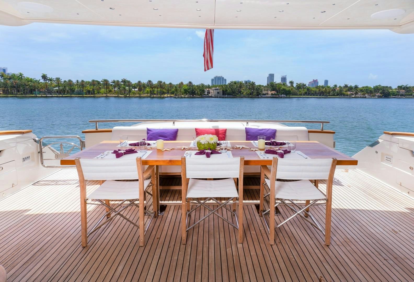 a table set for a dinner aboard CASUAL Yacht for Sale