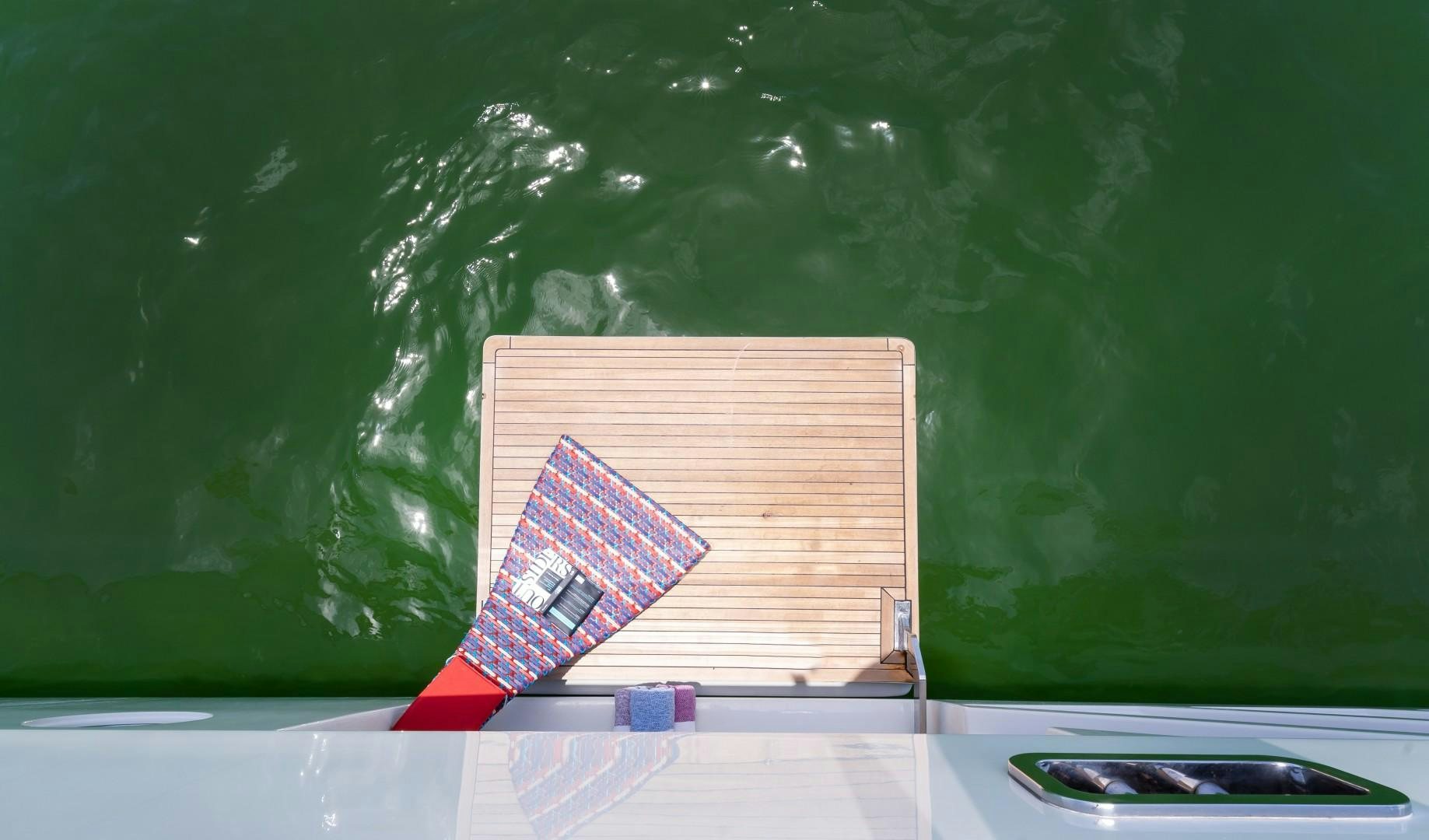 a book on a desk aboard CASUAL Yacht for Sale