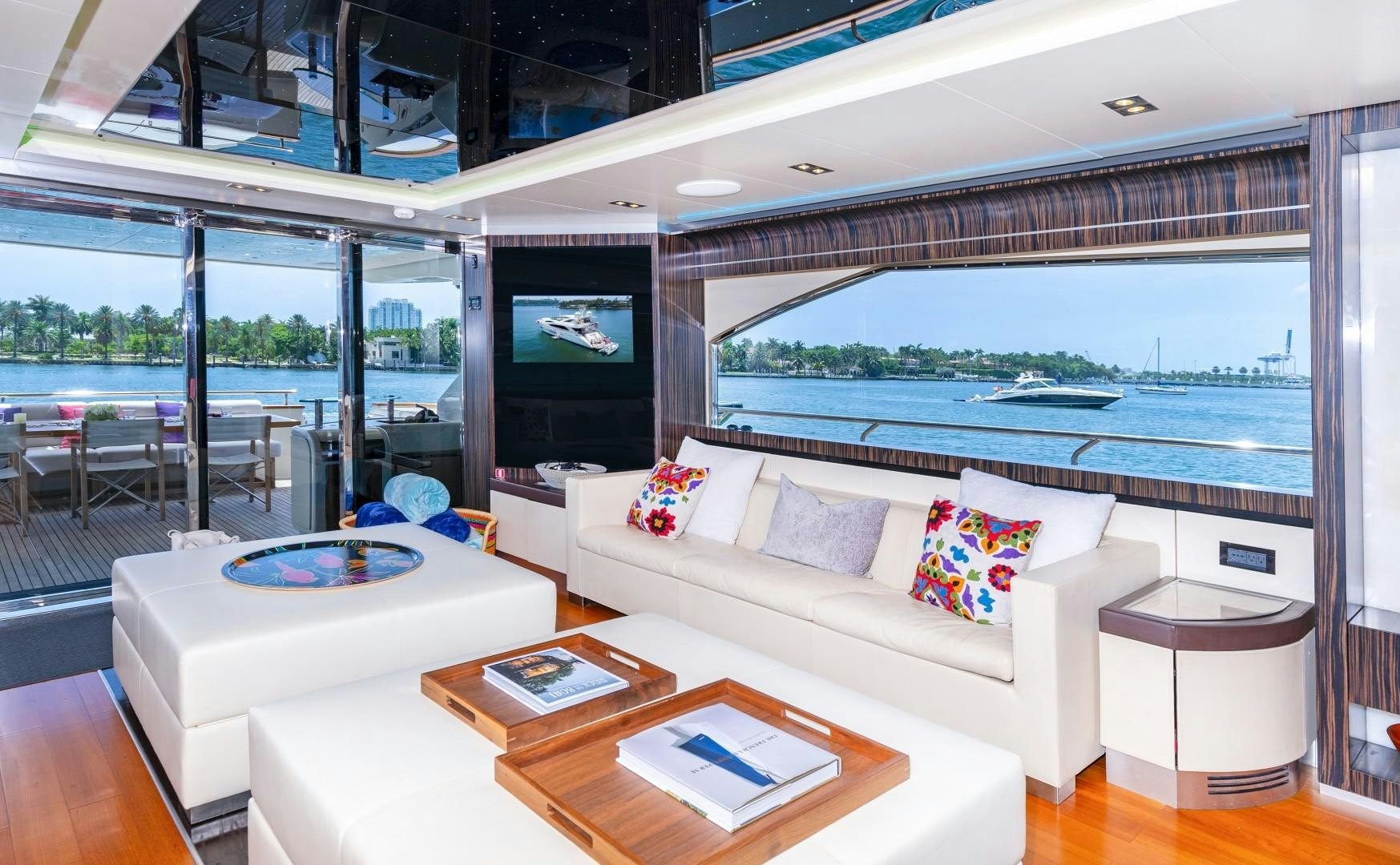 a living room with a large window aboard CASUAL Yacht for Sale