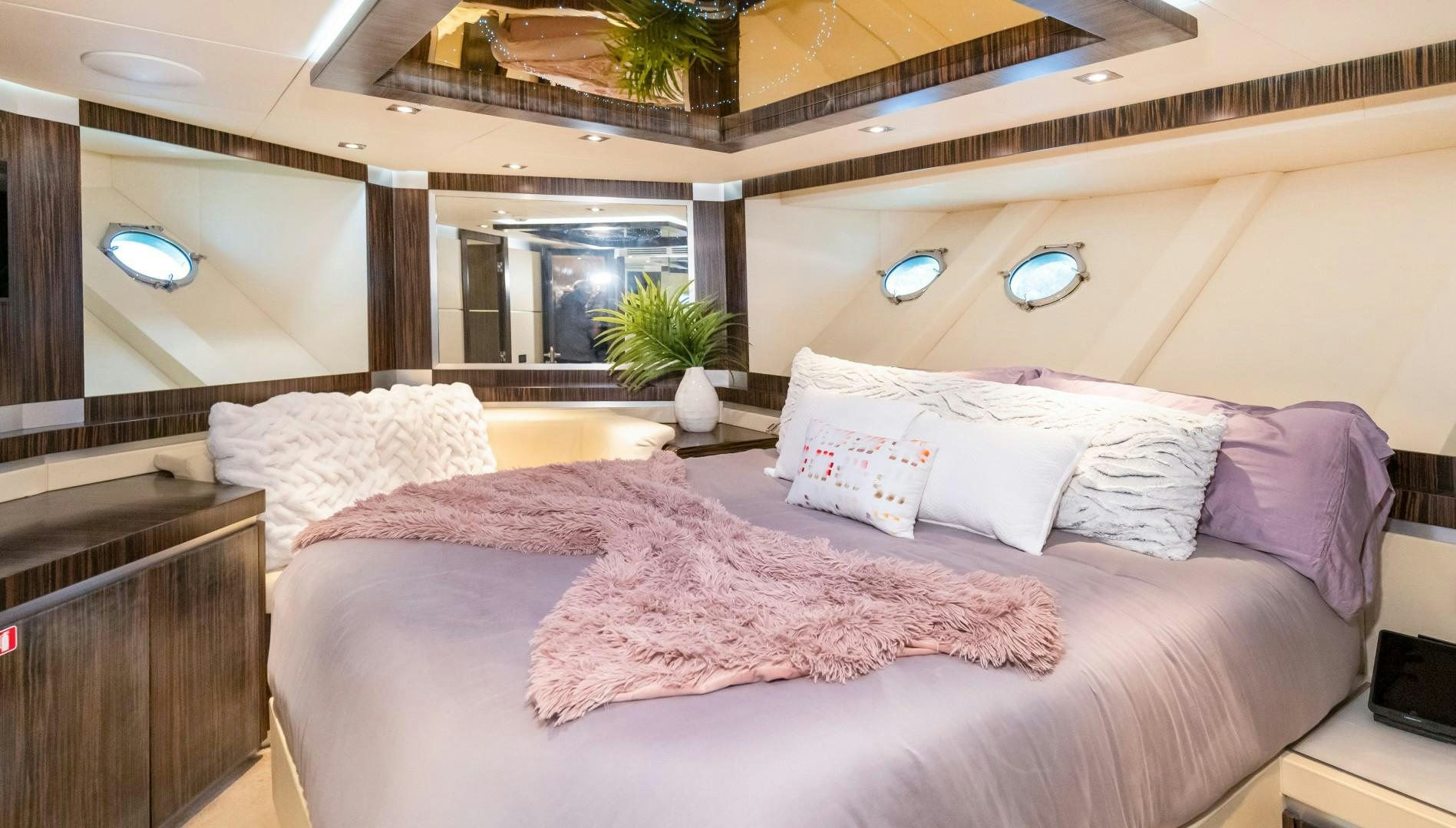 a room with a bed and a desk aboard CASUAL Yacht for Sale