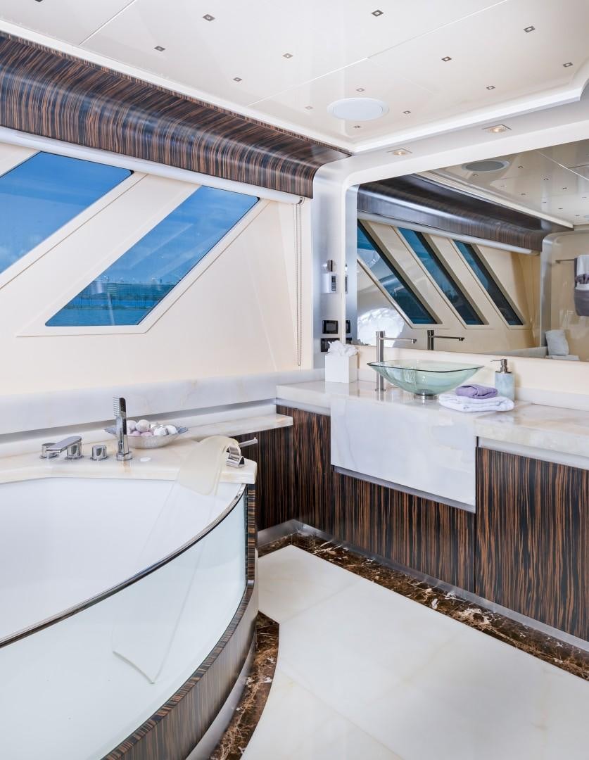 a bathroom with a sink and a bathtub aboard CASUAL Yacht for Sale