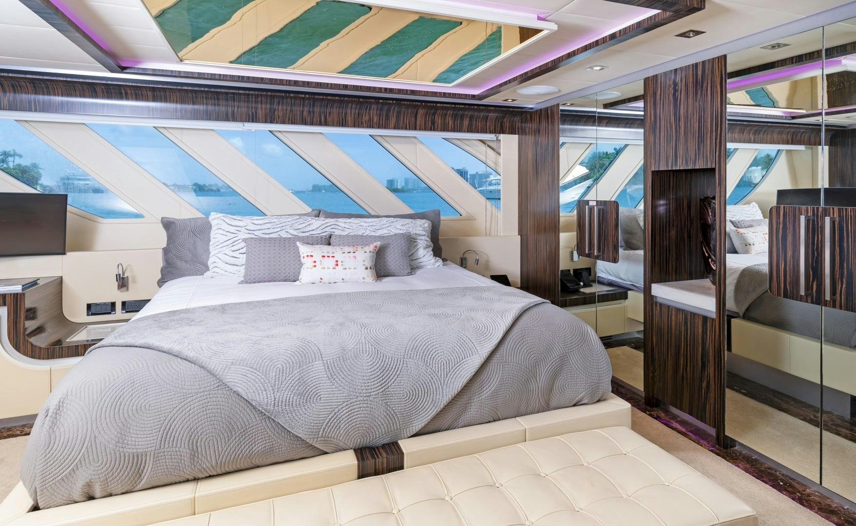 a bed with a large bed aboard CASUAL Yacht for Sale