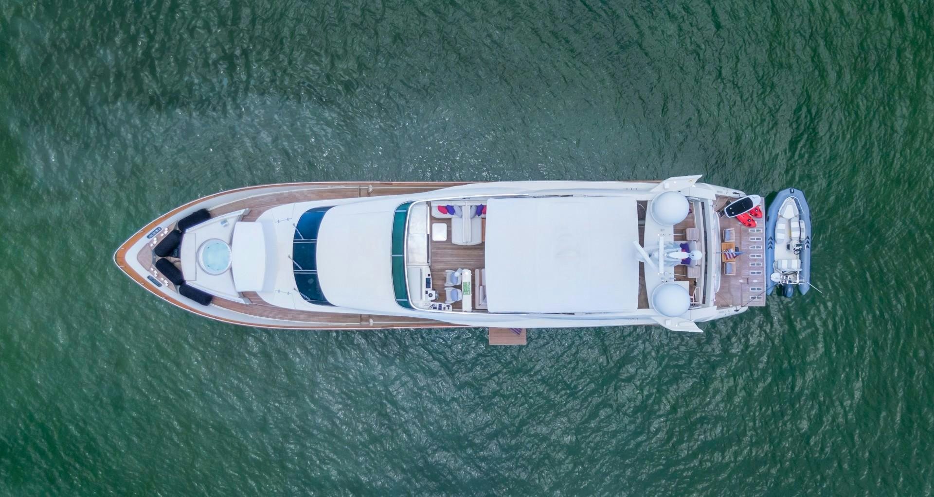 a small boat on a green surface aboard CASUAL Yacht for Sale
