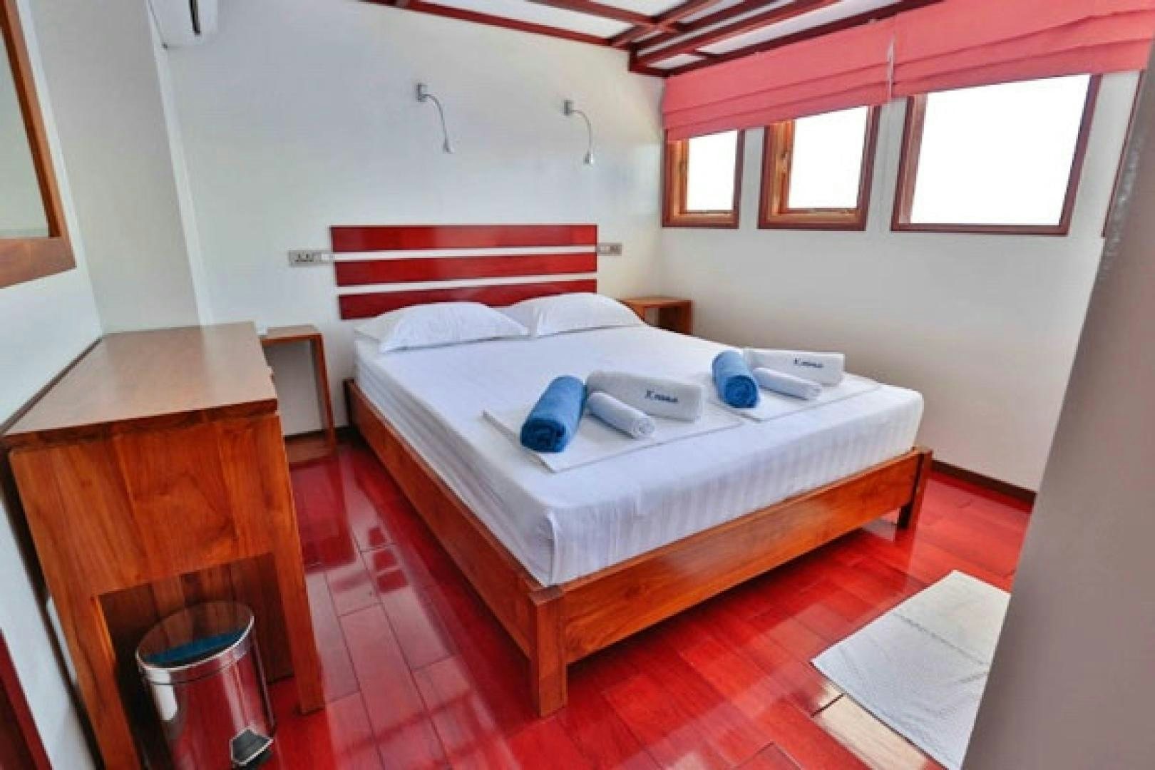a bed in a room aboard KEANA Yacht for Sale