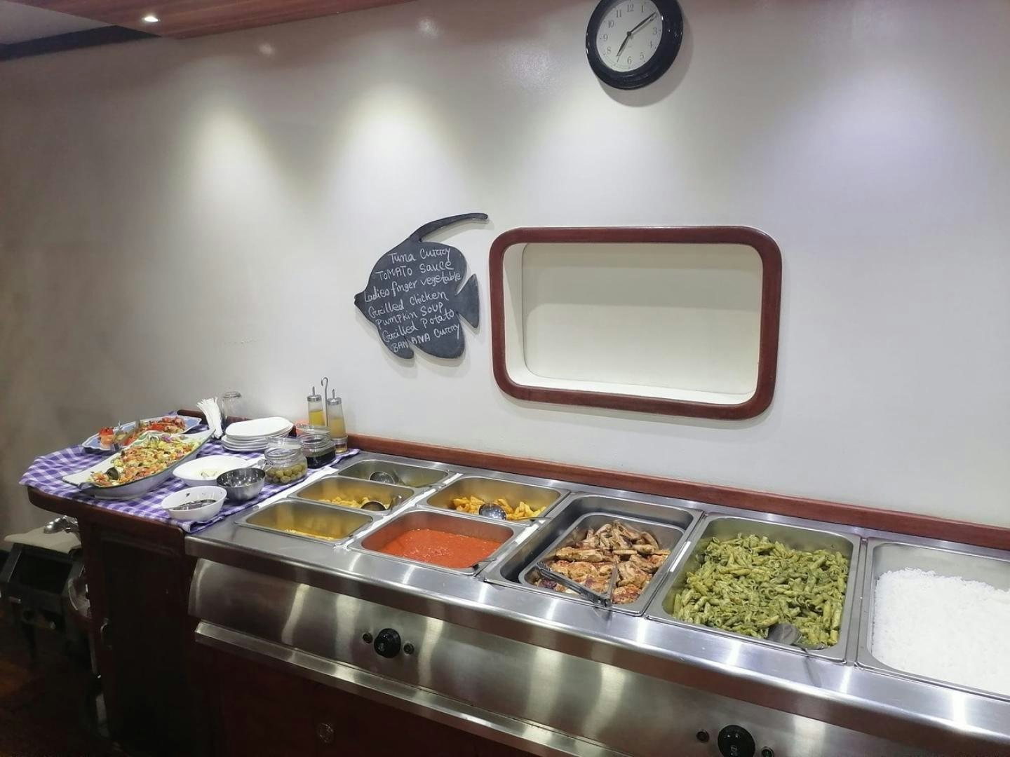 a kitchen with food on the counter aboard KEANA Yacht for Sale