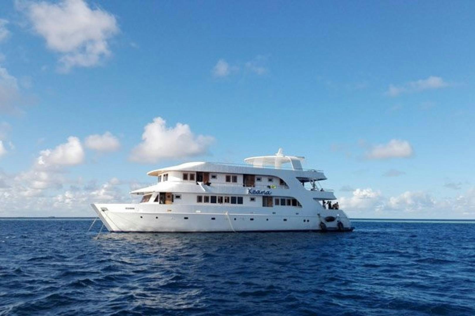 a white boat in the water aboard KEANA Yacht for Sale