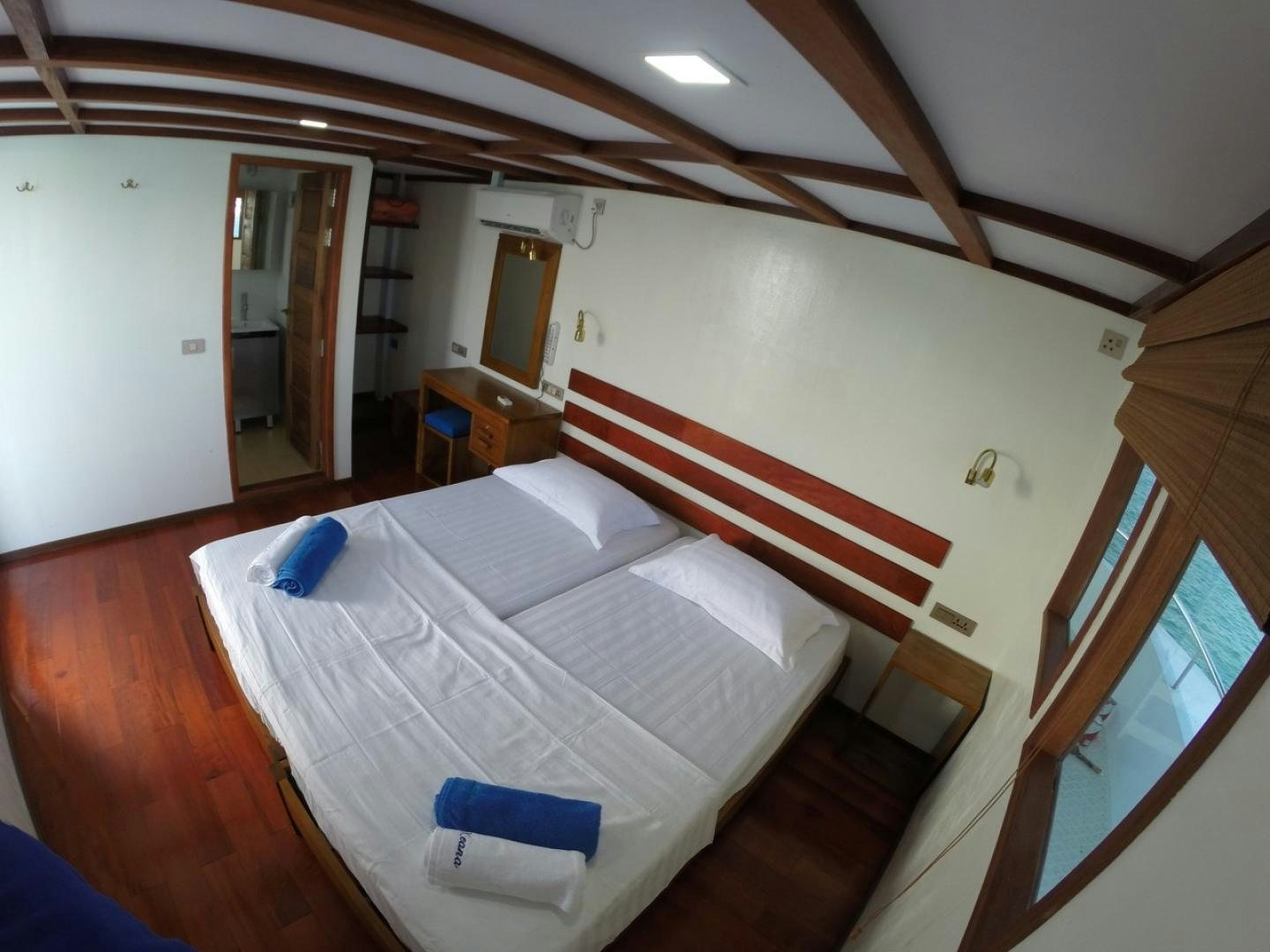a bed in a room aboard KEANA Yacht for Sale
