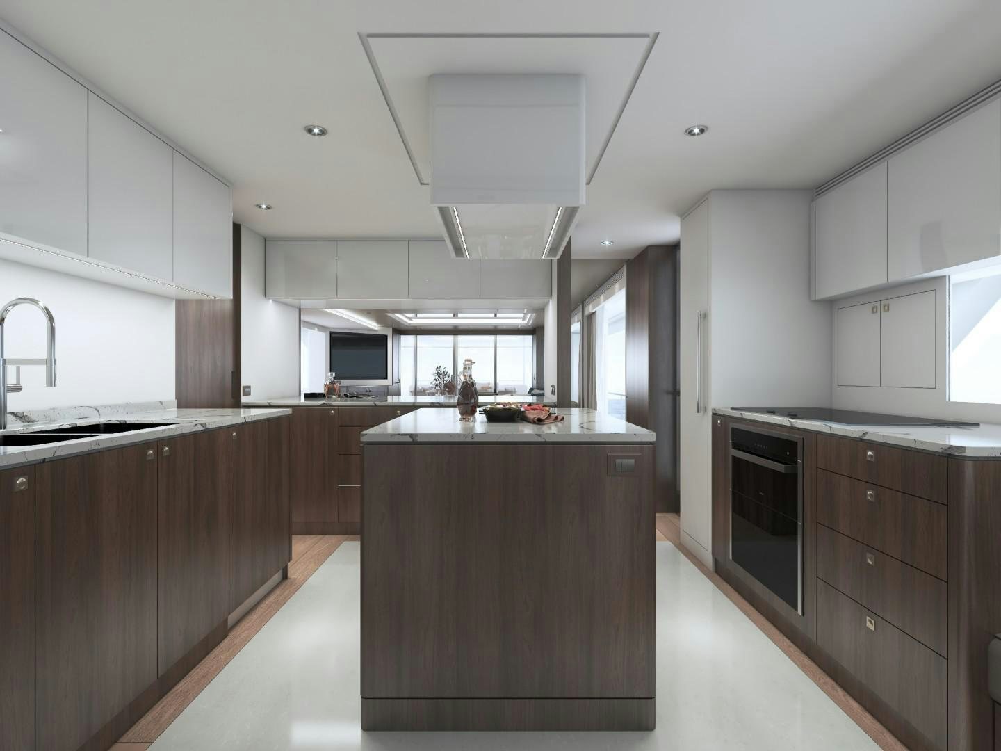 a large kitchen with a large island aboard FD100 Yacht for Sale