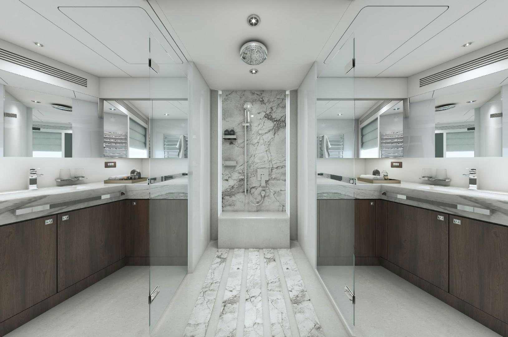a large bathroom with white tiles aboard FD100 Yacht for Sale