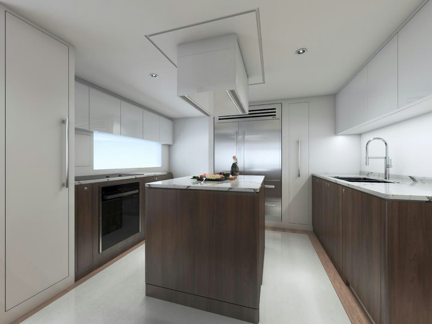 a kitchen with a large island aboard FD100 Yacht for Sale
