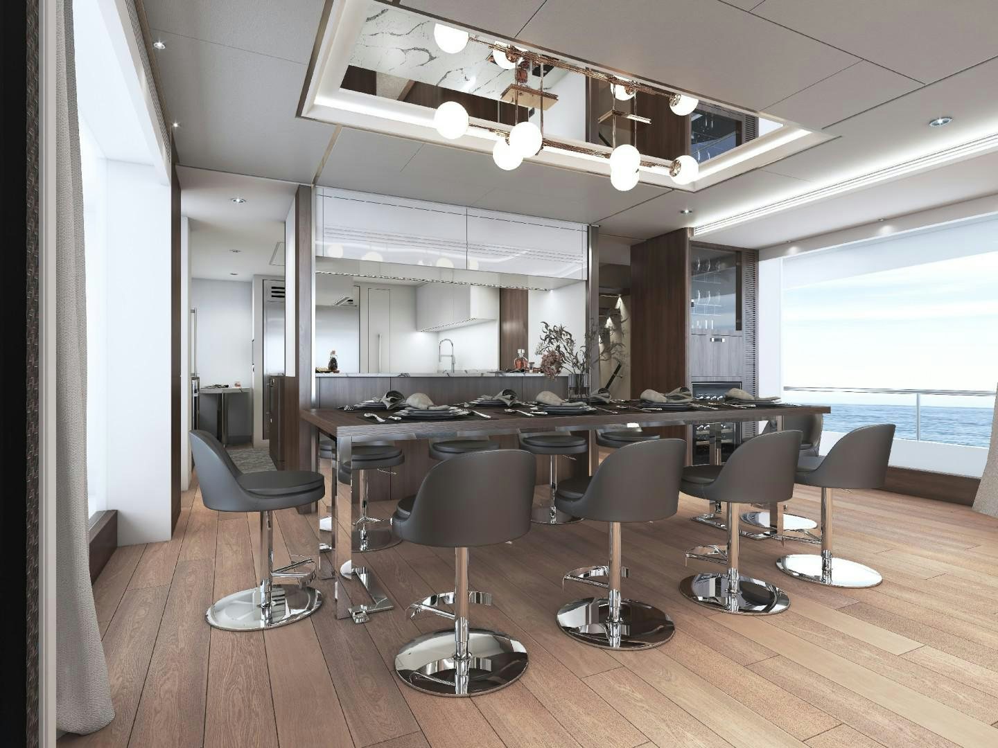 a room with a table and chairs aboard FD100 Yacht for Sale