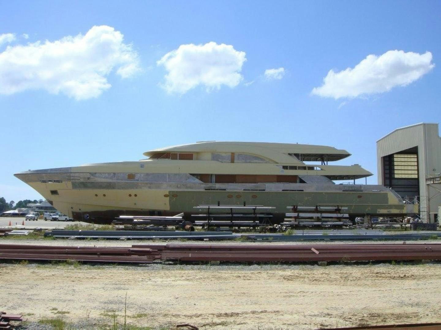 a large building with a parking lot aboard T 056 UNDER CONSTRUCTION Yacht for Sale