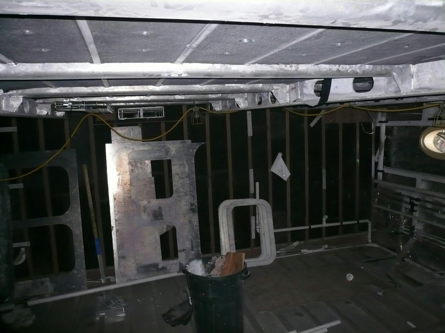 a room with a chair and a trash can aboard T 056 UNDER CONSTRUCTION Yacht for Sale