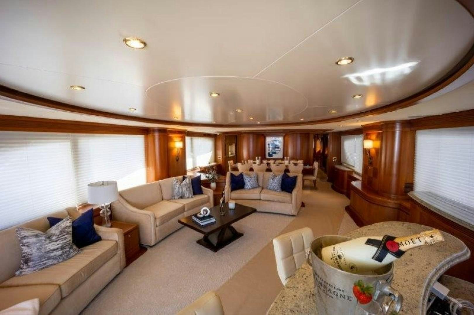 a living room with a couch and a coffee table aboard NYHAVEN Yacht for Sale