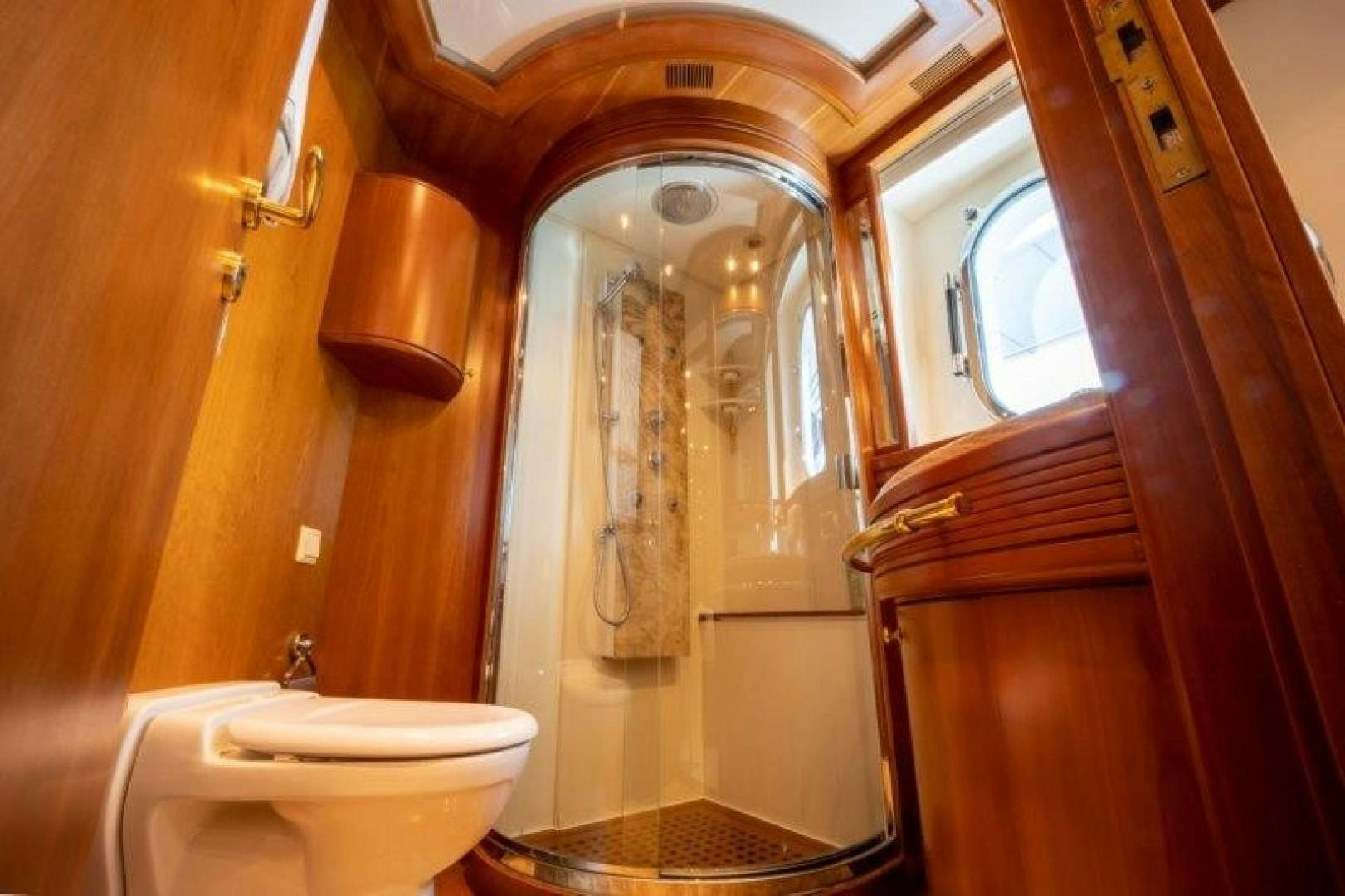 a bathroom with a glass shower aboard NYHAVEN Yacht for Sale