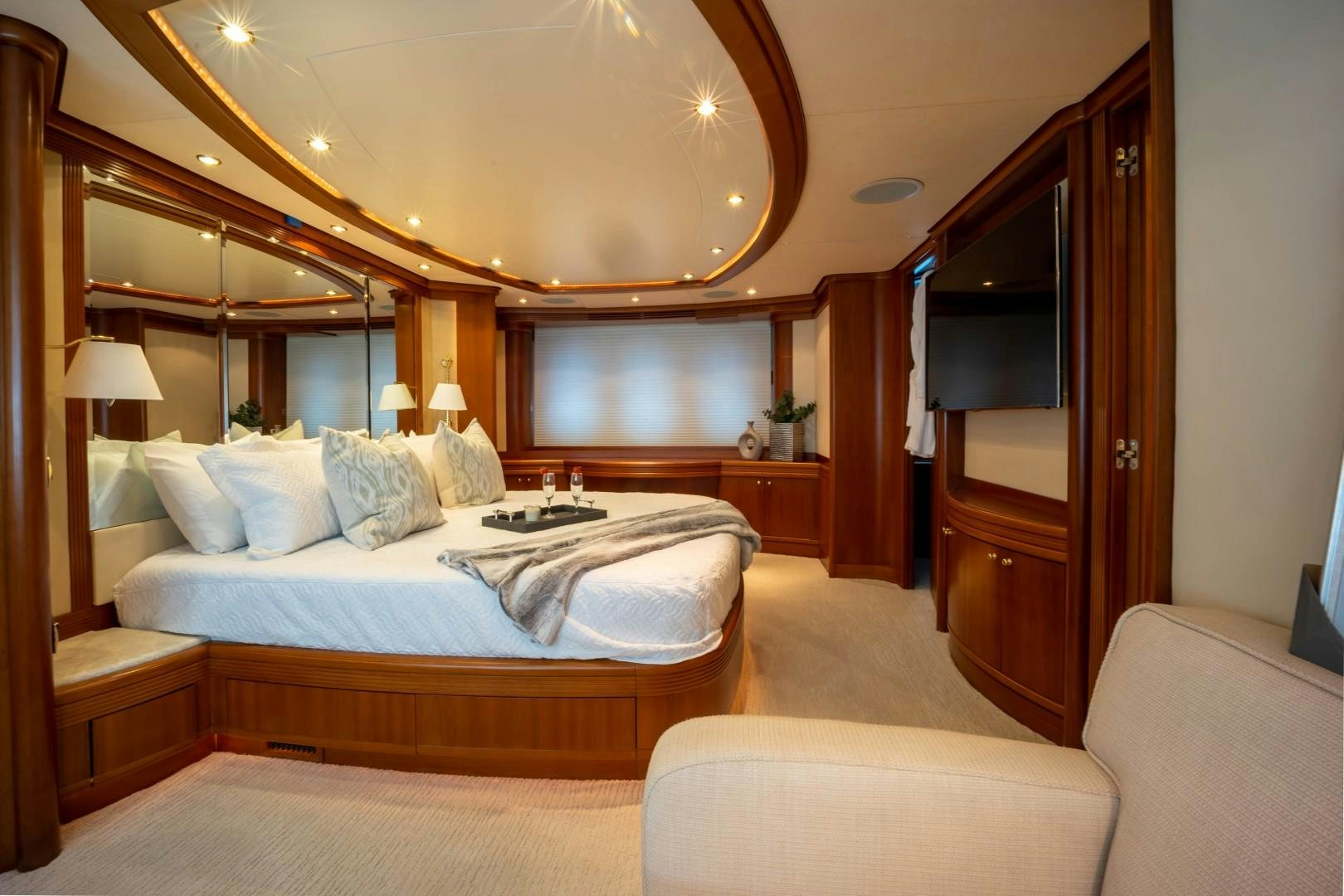 a large bedroom with a bed aboard NYHAVEN Yacht for Sale