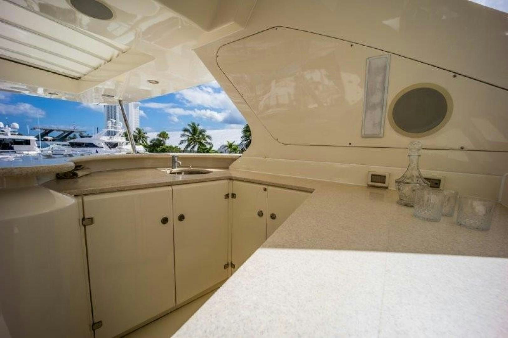 a kitchen with a large window aboard NYHAVEN Yacht for Sale